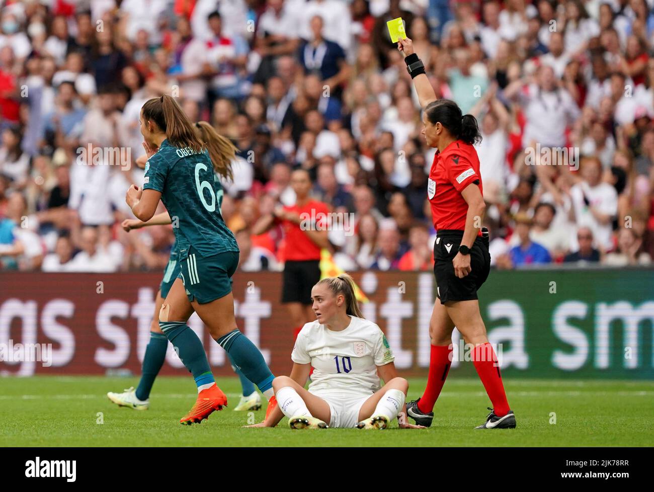Germany's Lena Oberdorf is shown a yellow card by referee Kateryna Monzul during the UEFA Women's Euro 2022 final at Wembley Stadium, London. Picture date: Sunday July 31, 2022. Stock Photo