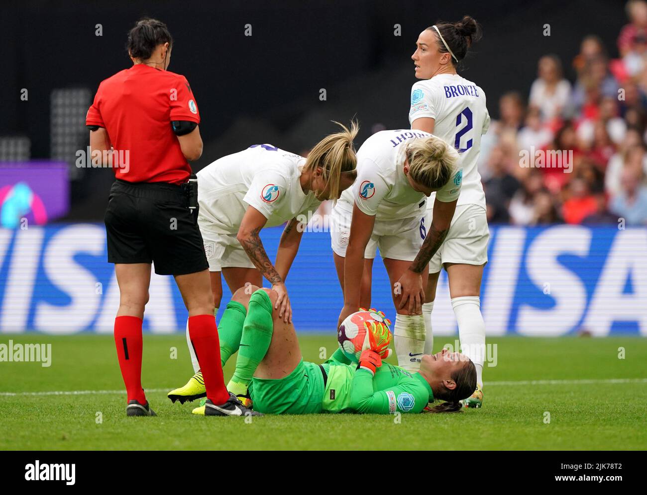 England goalkeeper Mary Earps lies in a heap after a challenge during the UEFA Women's Euro 2022 final at Wembley Stadium, London. Picture date: Sunday July 31, 2022. Stock Photo