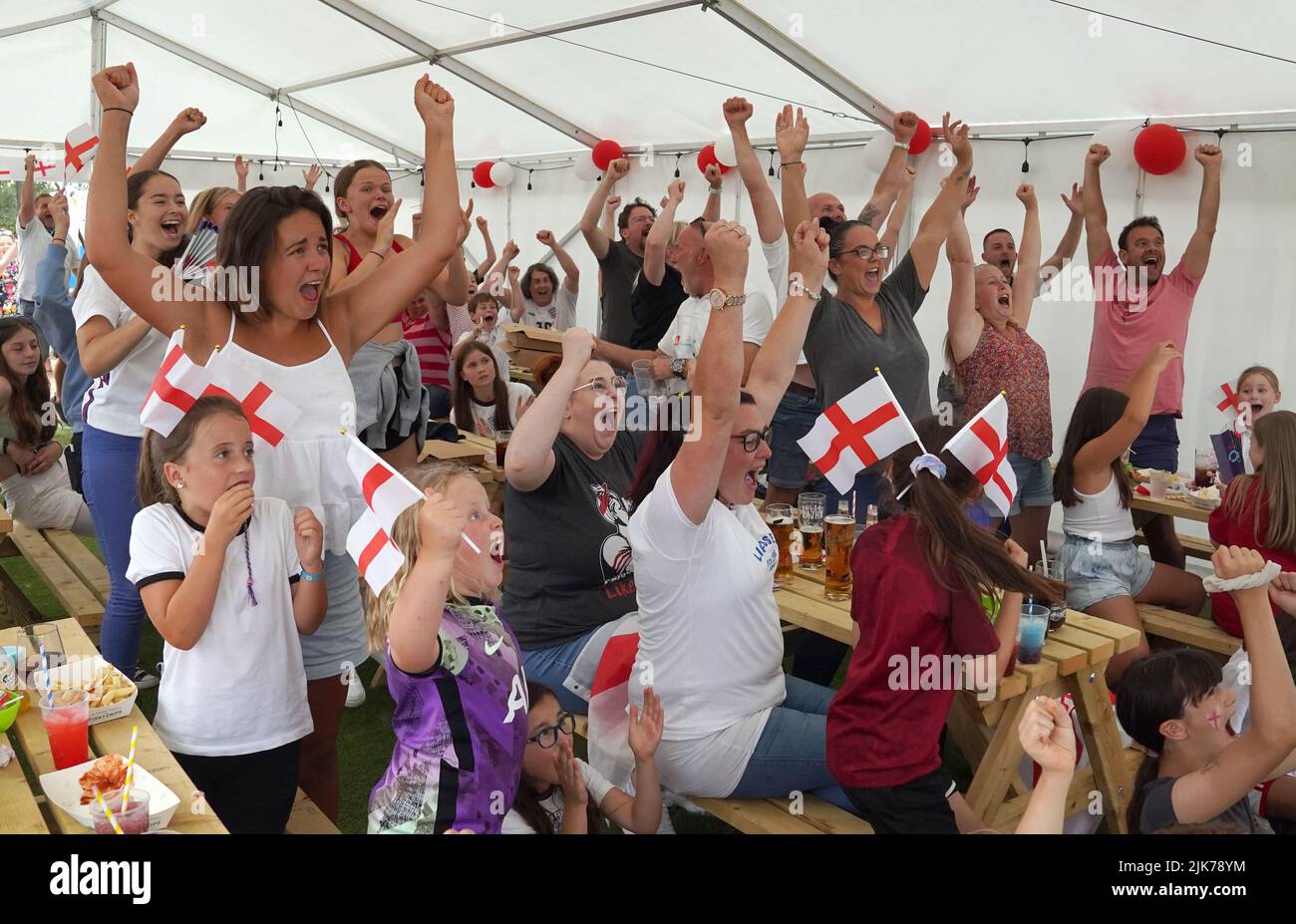 Fans in Aylesbury United WFC, the former club of Lionesses forward Ellen White, in Bierton, Aylesbury, celebrate the opening goal as they watch a screening of the UEFA Women's Euro 2022 final held at Wembley Stadium, London. Picture date: Sunday July 31, 2022. Stock Photo