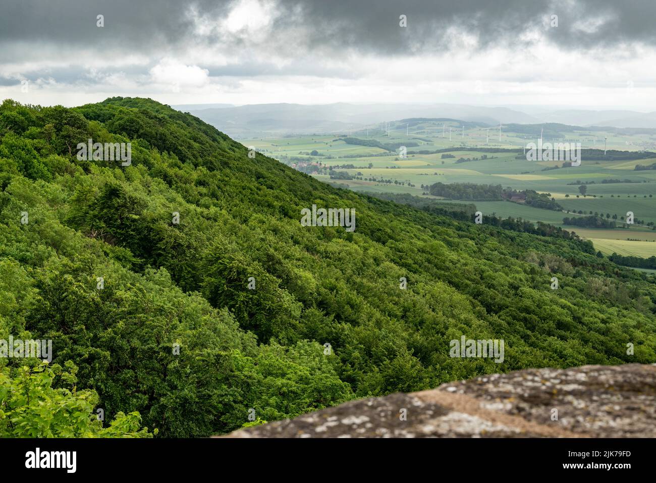 View from the 'Ithturm' lookout tower over the Ith ridge on a cloudy day, Weserbergland, Lower Saxony, Germany Stock Photo
