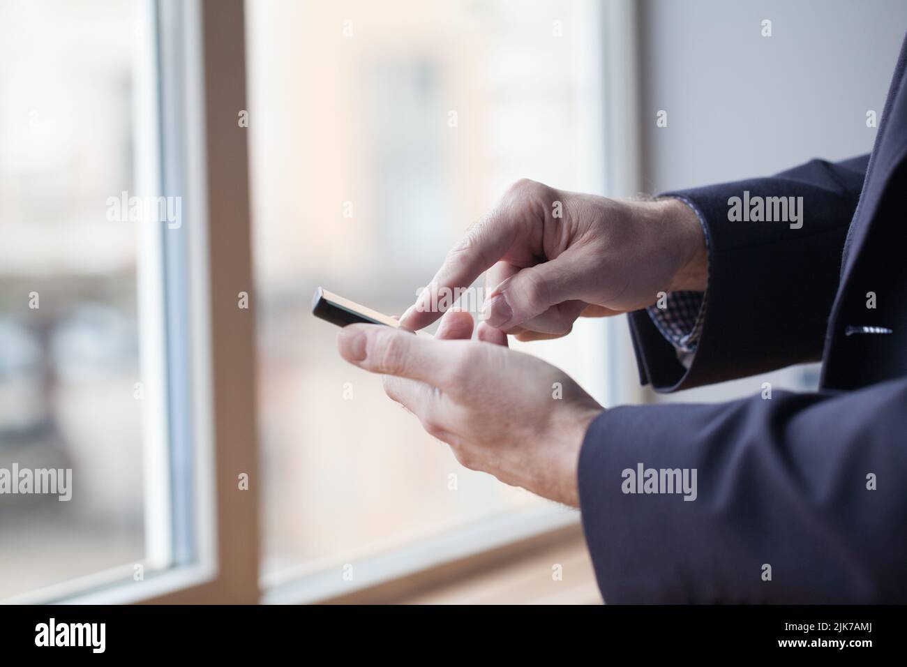Close up of a man using mobile smart phone Stock Photo - Alamy