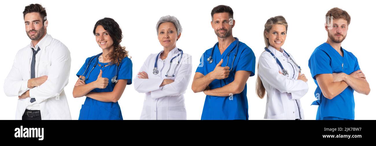 Successful group of doctors standing with arms crossed or giving thumbs up in a row isolated on white background Stock Photo