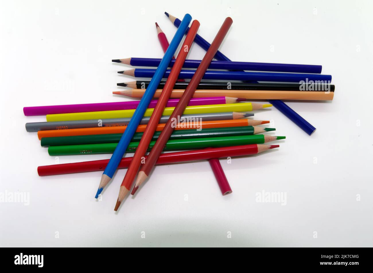 Painting and drawing: Different colored pencils in front of white background arranged crosswise Stock Photo
