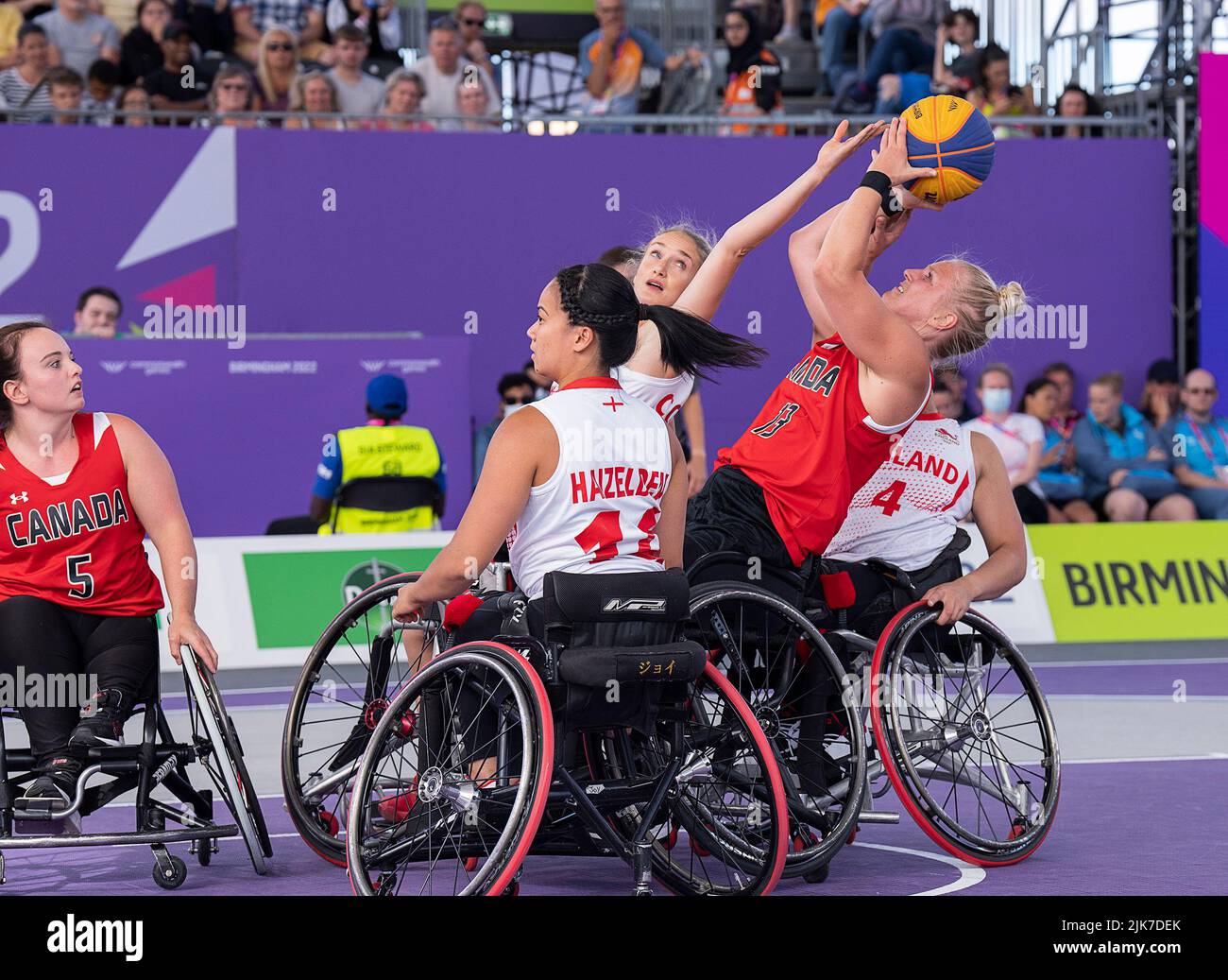 Birmingham, UK. 31st July, 2022. England's Amy Conroy defends as Canada's Kady Dandeneau shoots on the way to a 13-8 victory in women's 3x3 wheelchair basketball action at the Commonwealth Games in Birmingham, England on Sunday, July 31, 2022. THE CANADIAN PRESS/Andrew Vaughan Credit: The Canadian Press/Alamy Live News Stock Photo
