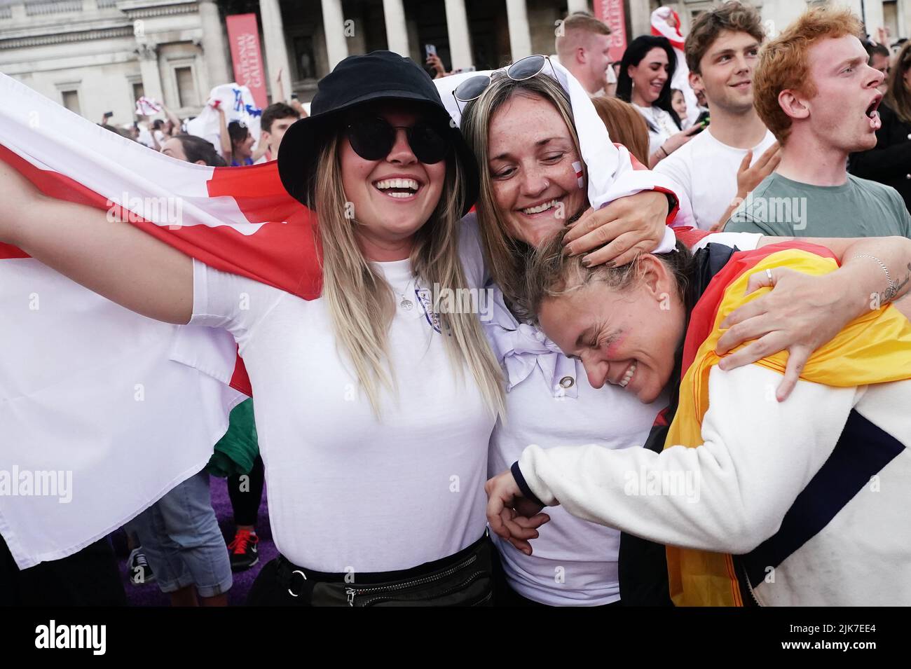 Fans celebrate the final whistle in Trafalgar Square, London, after watching the screening of the UEFA Women's Euro 2022 final held at Wembley Stadium, London. Picture date: Sunday July 31, 2022. Stock Photo