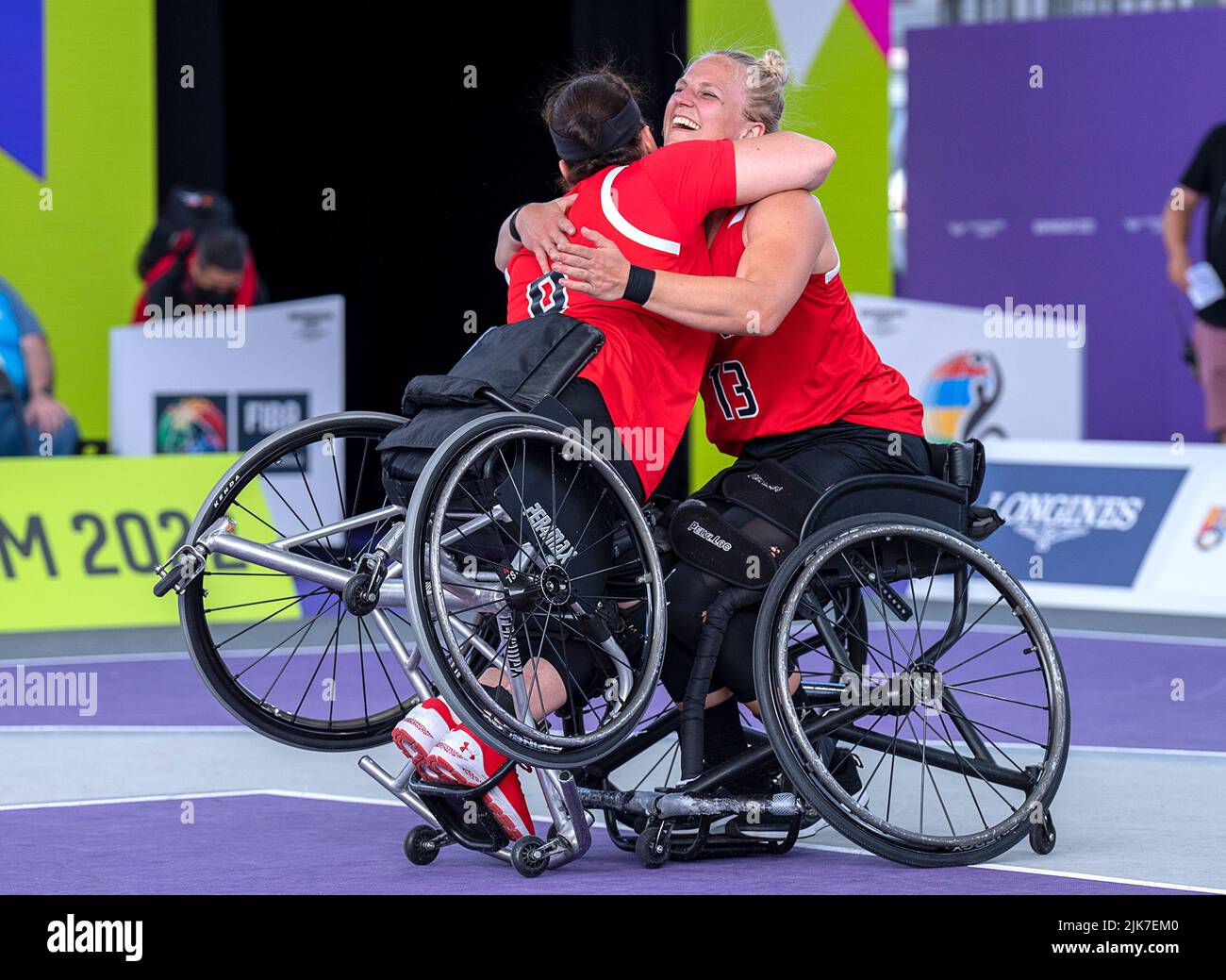 July 31, 2022, Birmingham, West Midlands, England: Canada's Kady Dandeneau, right, embraces teammate Tamara Steeves after defeating England 13-8 in women's 3x3 wheelchair basketball action at the Commonwealth Games in Birmingham, England on Sunday, July 31, 2022. (Credit Image: © Andrew Vaughan/The Canadian Press via ZUMA Press) Stock Photo