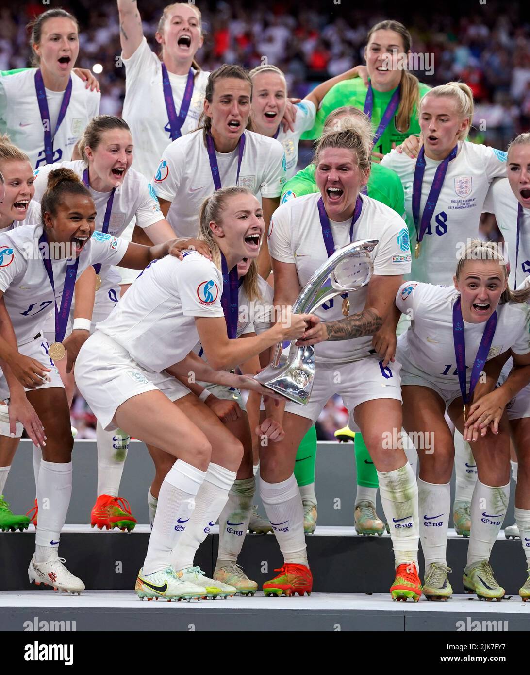 England's Leah Williamson and Millie Bright celebrate with the trophy following victory over Germany in the UEFA Women's Euro 2022 final at Wembley Stadium, London. Picture date: Sunday July 31, 2022. Stock Photo