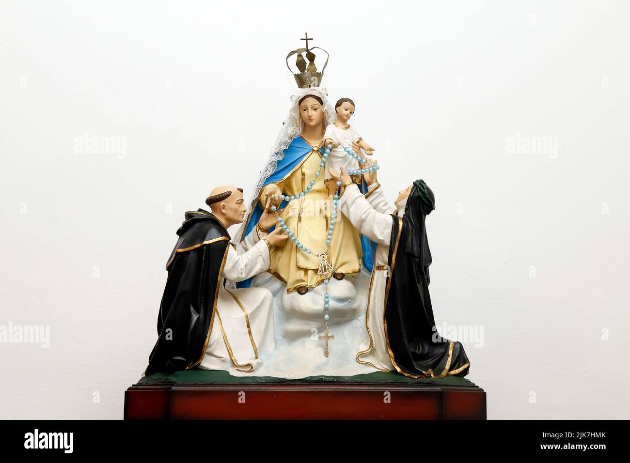 Statue of the image of Our Lady of Rosary Pompeii with baby Jesus, Saint Dominic of Gusmao and Saint Catherine of Seine - Nossa Senhora do Rosario de Stock Photo
