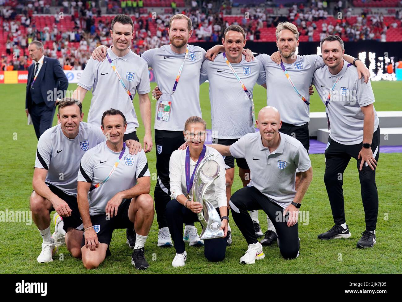 England head coach Sarina Wiegman and her backroom staff celebrate with the trophy following during the UEFA Women's Euro 2022 final at Wembley Stadium, London. Picture date: Sunday July 31, 2022. Stock Photo