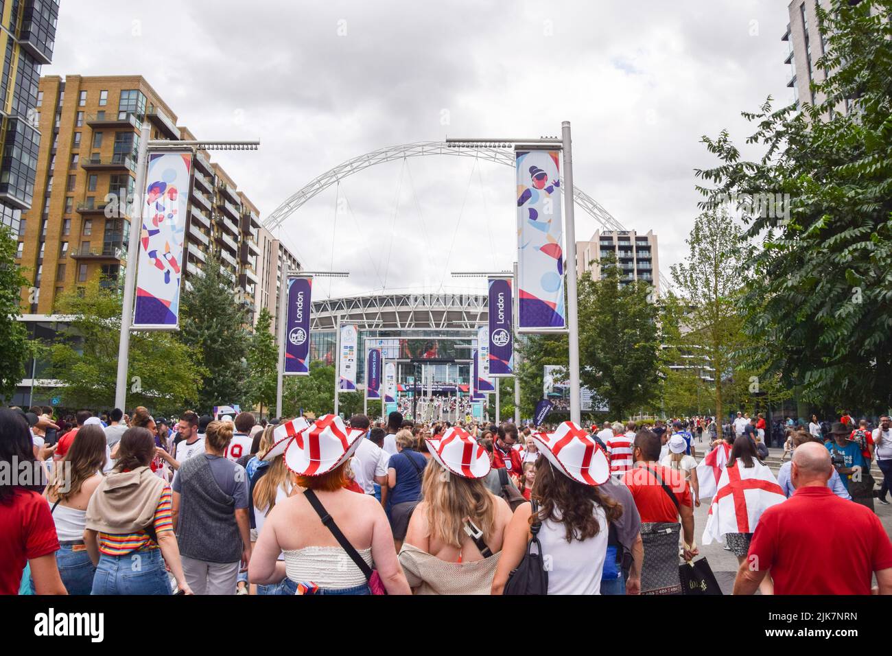 London, UK. 31st July, 2022. Fans arrive at Wembley Stadium for the UEFA Women's Euro football final match, with England playing against Germany. Credit: SOPA Images Limited/Alamy Live News Stock Photo
