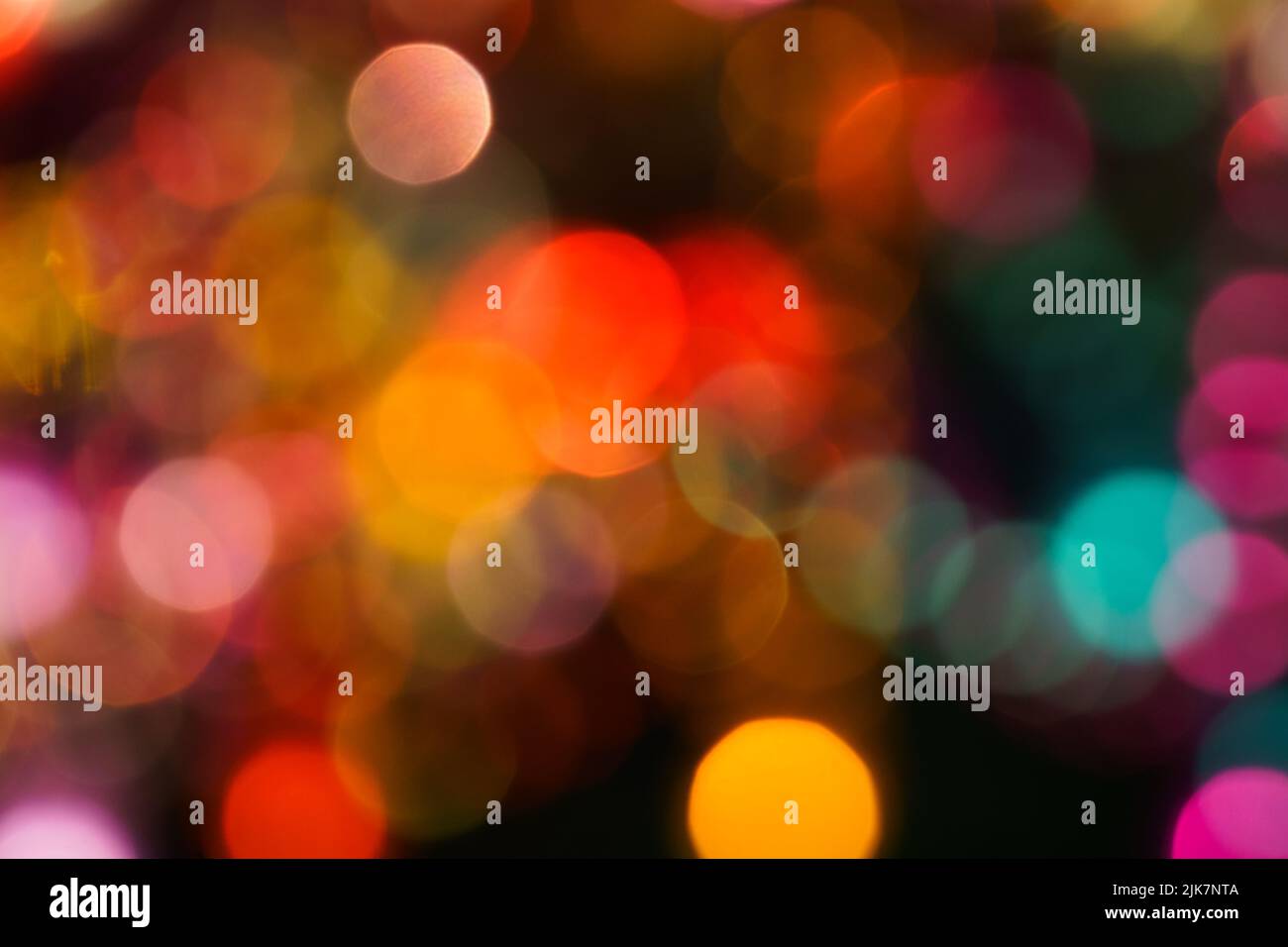Abstract background with colorful bokeh defocused lights and creative ...