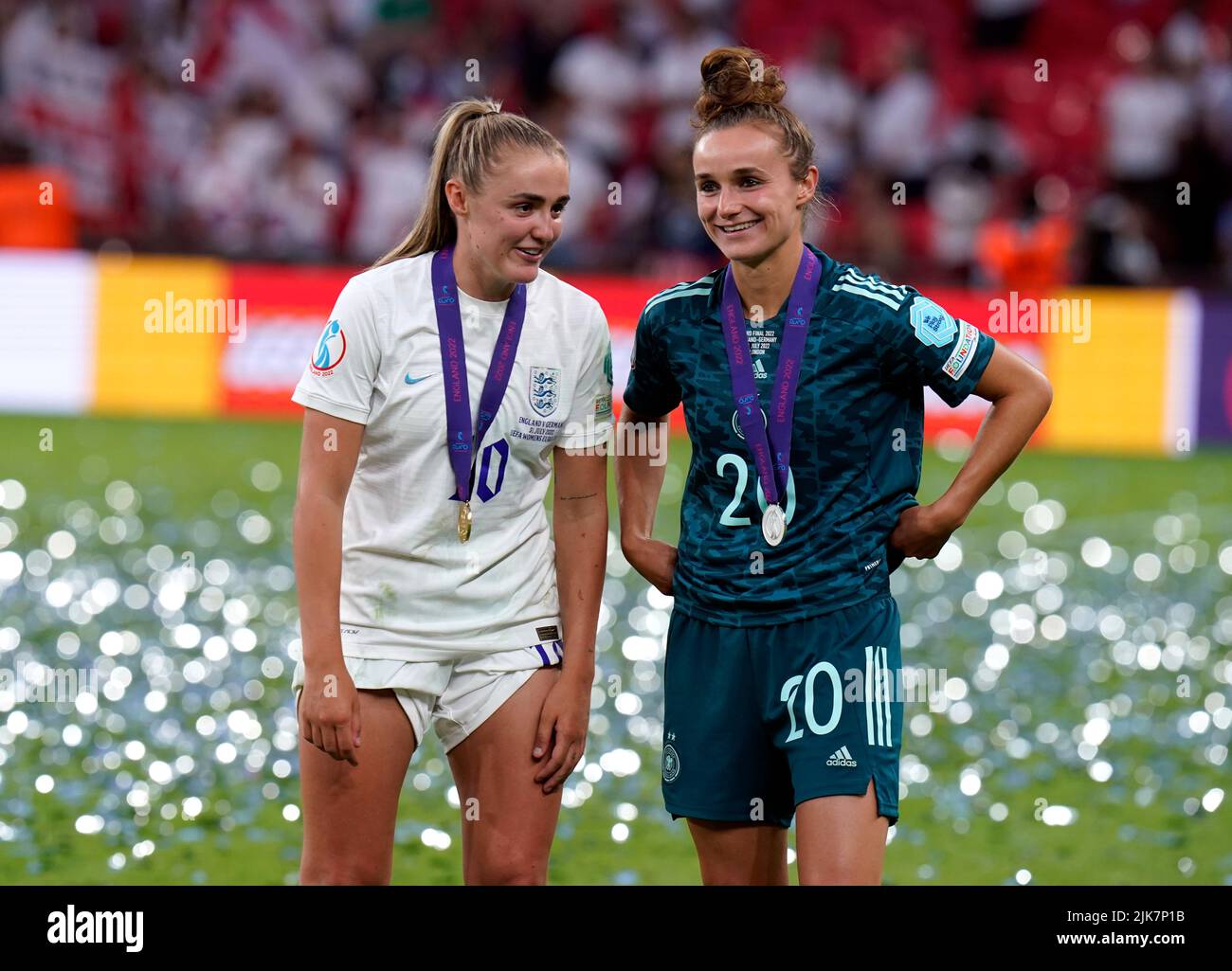 England's Georgia Stanway (left) with Germany's Lina Magull following the UEFA Women's Euro 2022 final at Wembley Stadium, London. Picture date: Sunday July 31, 2022. Stock Photo