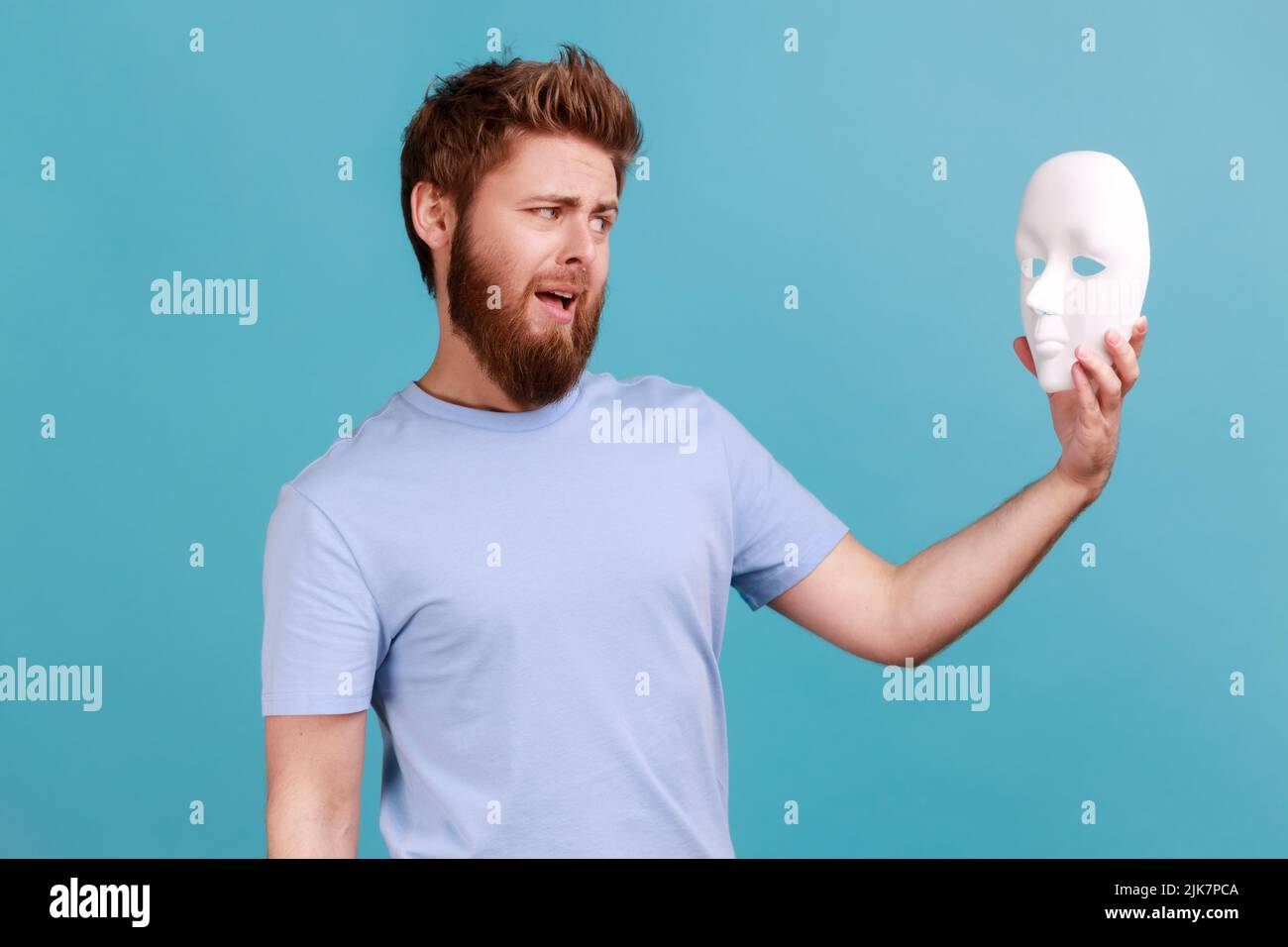 Man holding mask face hi-res stock photography and images - Alamy