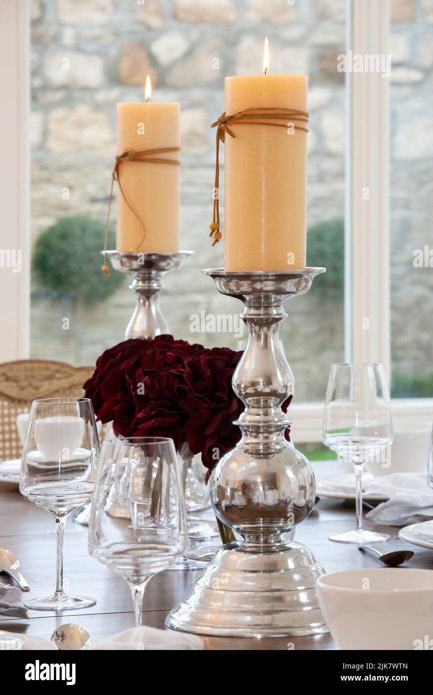 candles in table setting Stock Photo