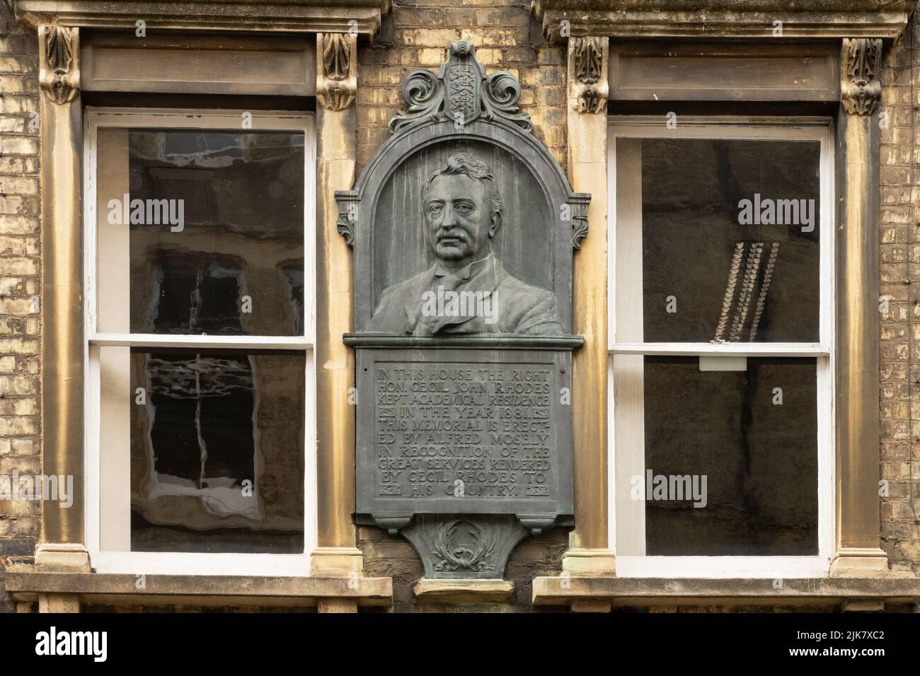 A controversial plaque relating to Cecil Rhodes is located between first floor windows of Oriel College owned 6 King Edward Street, Oxford. The plaque is just two streets away from the Cecil Rhodes statue that the Rhodes Must Fall movement have campaigned to have removed. Culture Secretary Nadine Dorries overruled Historic England and gave the plaque Grade II Listed status in July 2022. Credit: Stephen Bell/Alamy Stock Photo