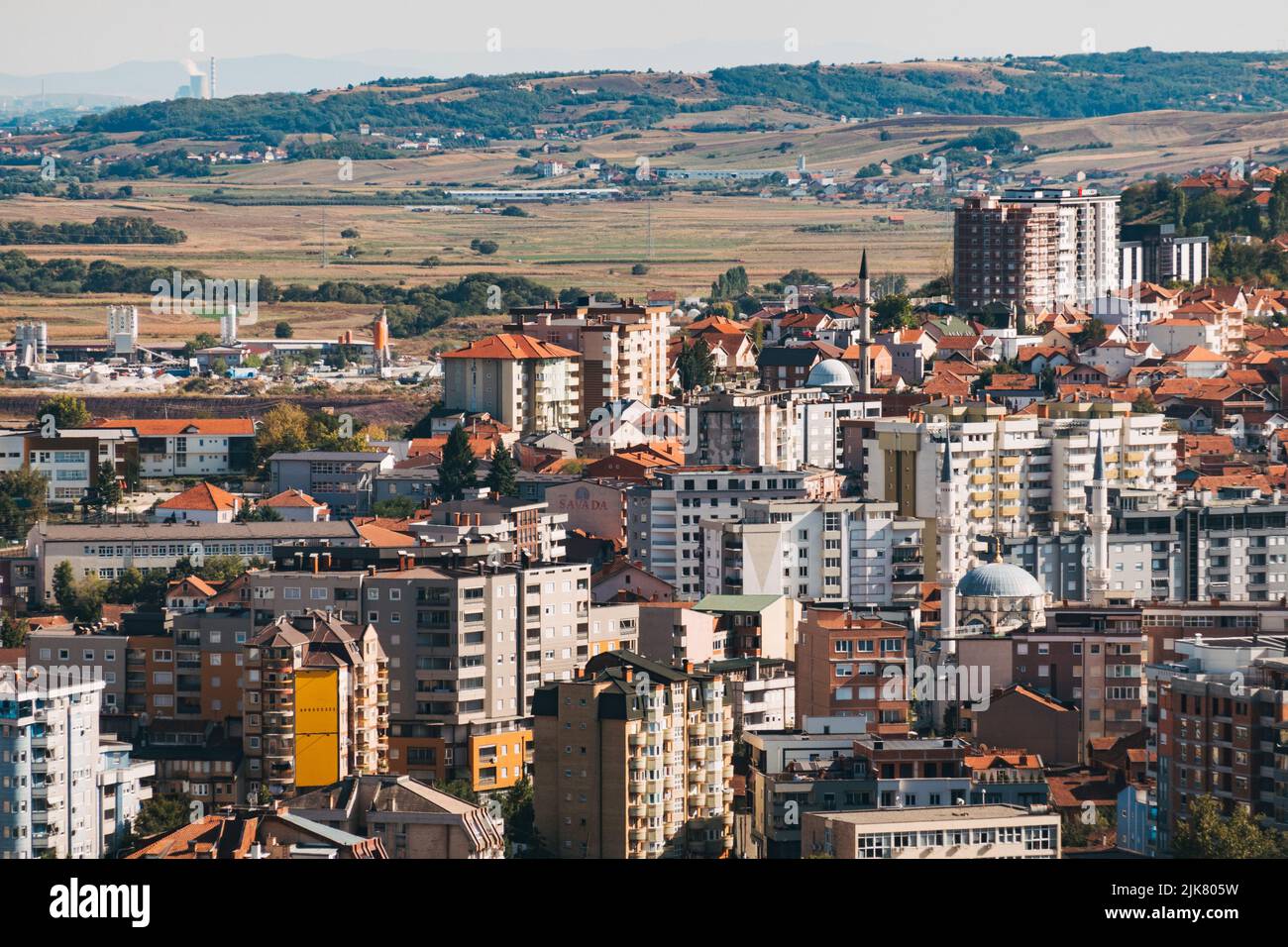 Looking out over the apartment blocks in the Balkan city of Mitrovica, Kosovo, from Miner's Hill Stock Photo