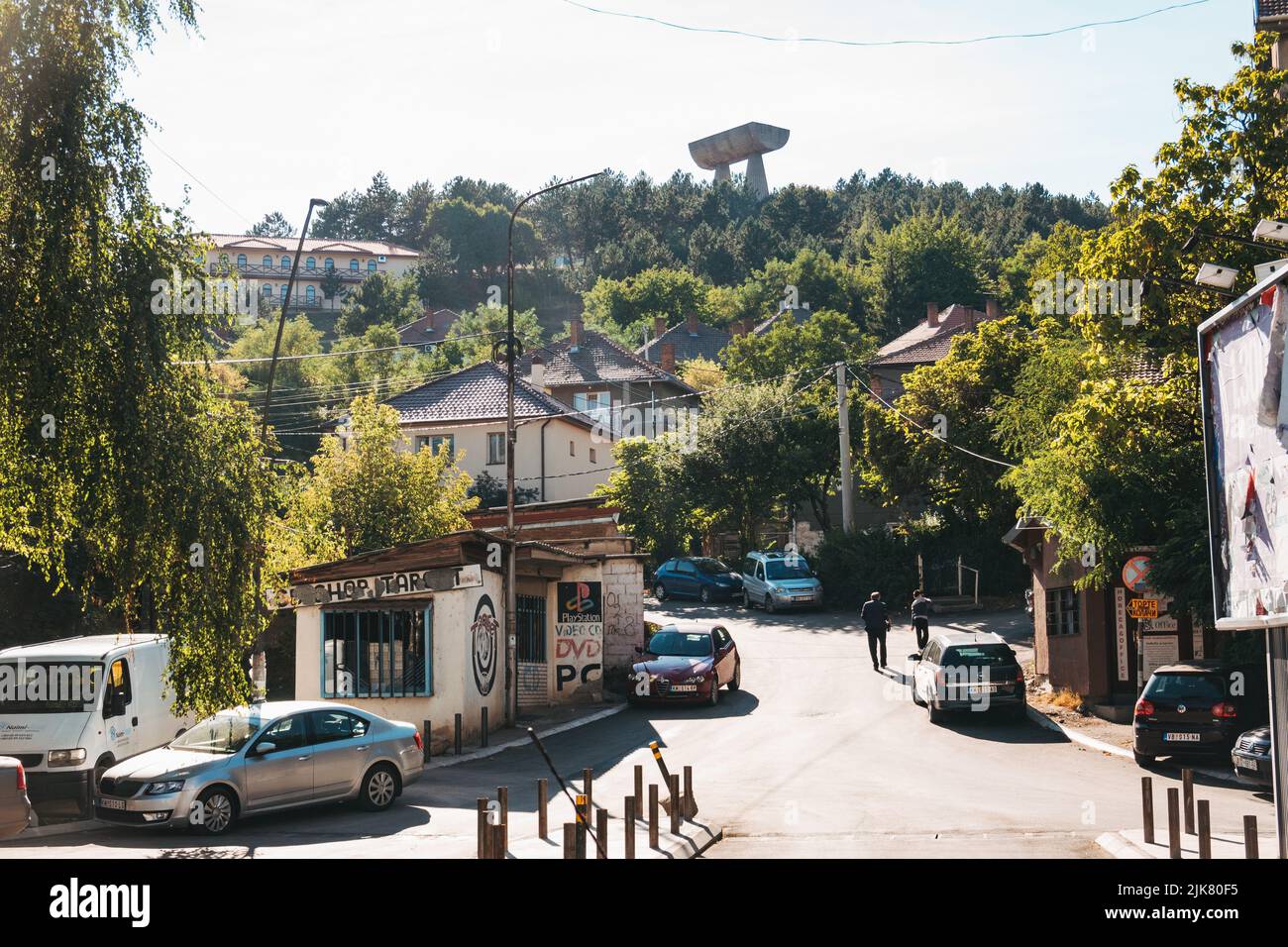 looking toward Miner's Hill with its large Yugoslav-era monument, in the city of Mitrovica, Kosovo Stock Photo