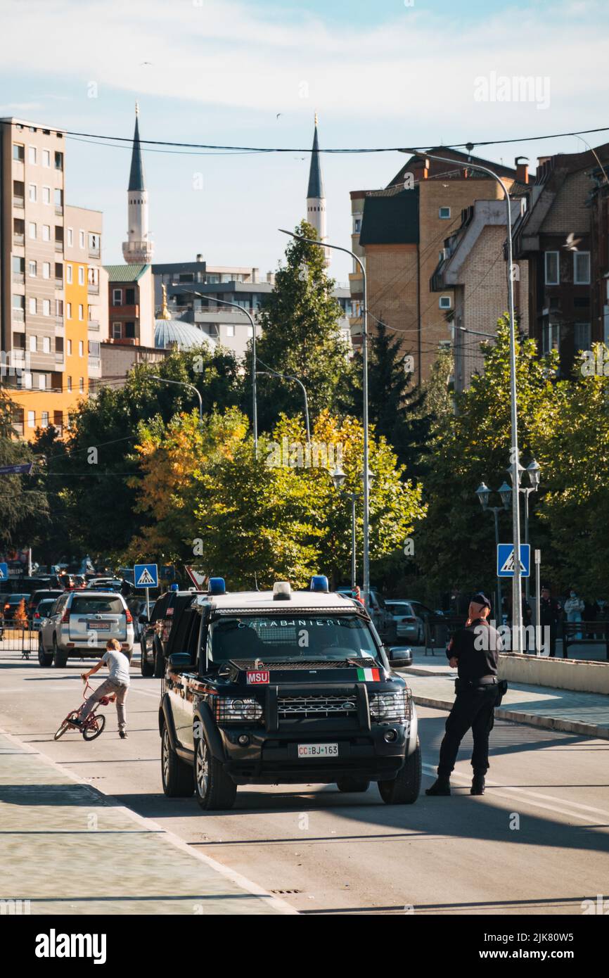 Italian Carabinieri stationed on the New Bridge in Mitrovica, Kosovo, to maintain peace between the city's Serbian north and Kosovar south. Stock Photo