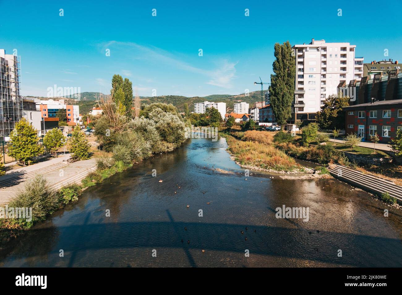 Looking over the Ibar river from the New Bridge in Mitrovica, Kosovo Stock Photo