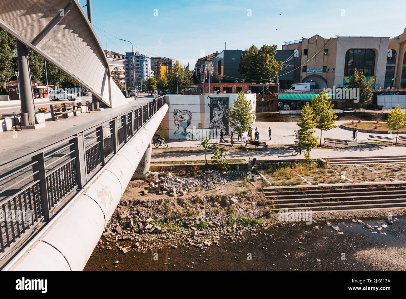 The New Bridge in Mitrovica, northern Kosovo, over the Ibar river which divides the city into north and south. Stock Photo