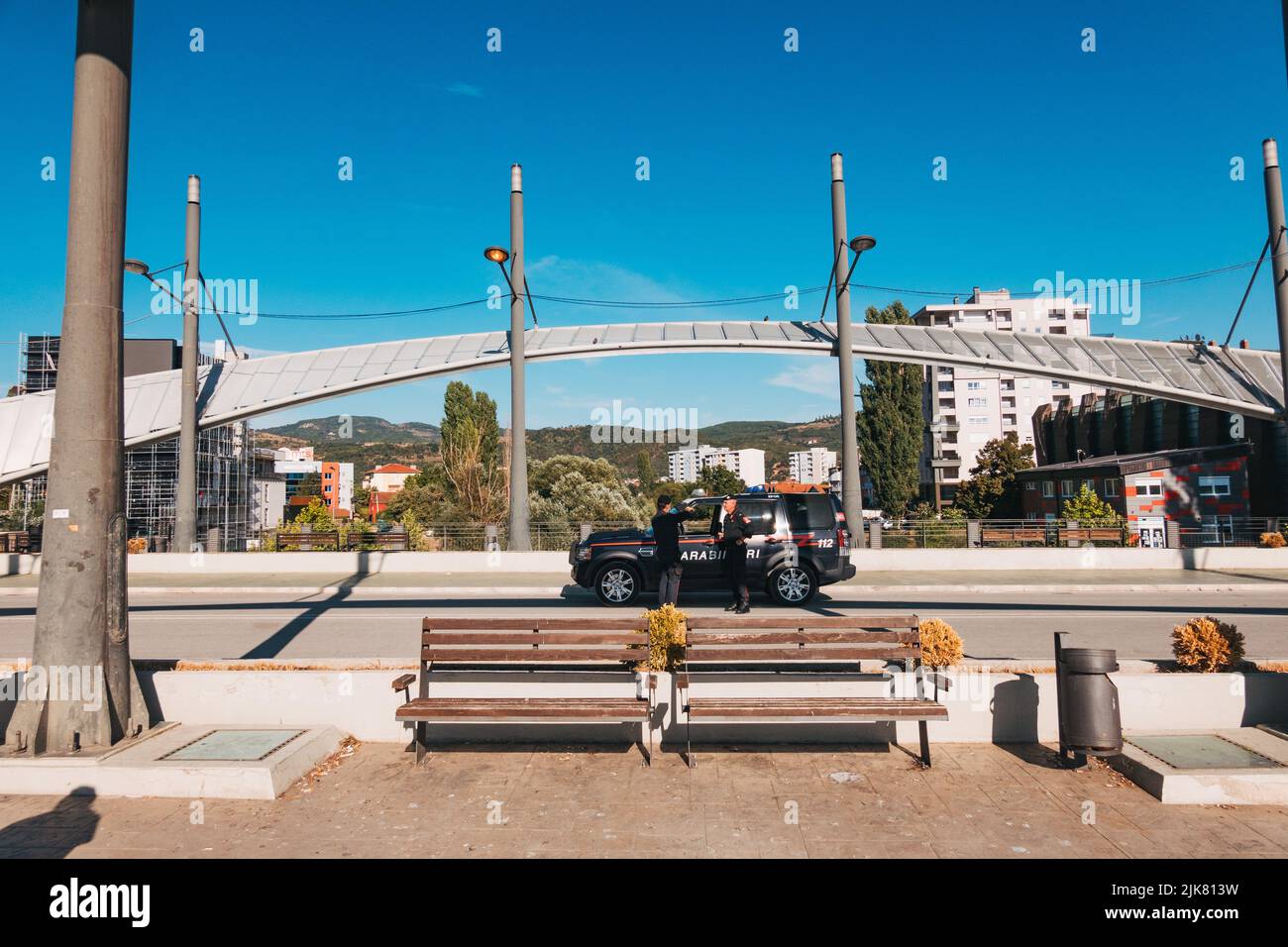 Italian Carabinieri stationed on the New Bridge in Mitrovica, Kosovo, to maintain peace between the city's Serbian north and Kosovar south. Stock Photo