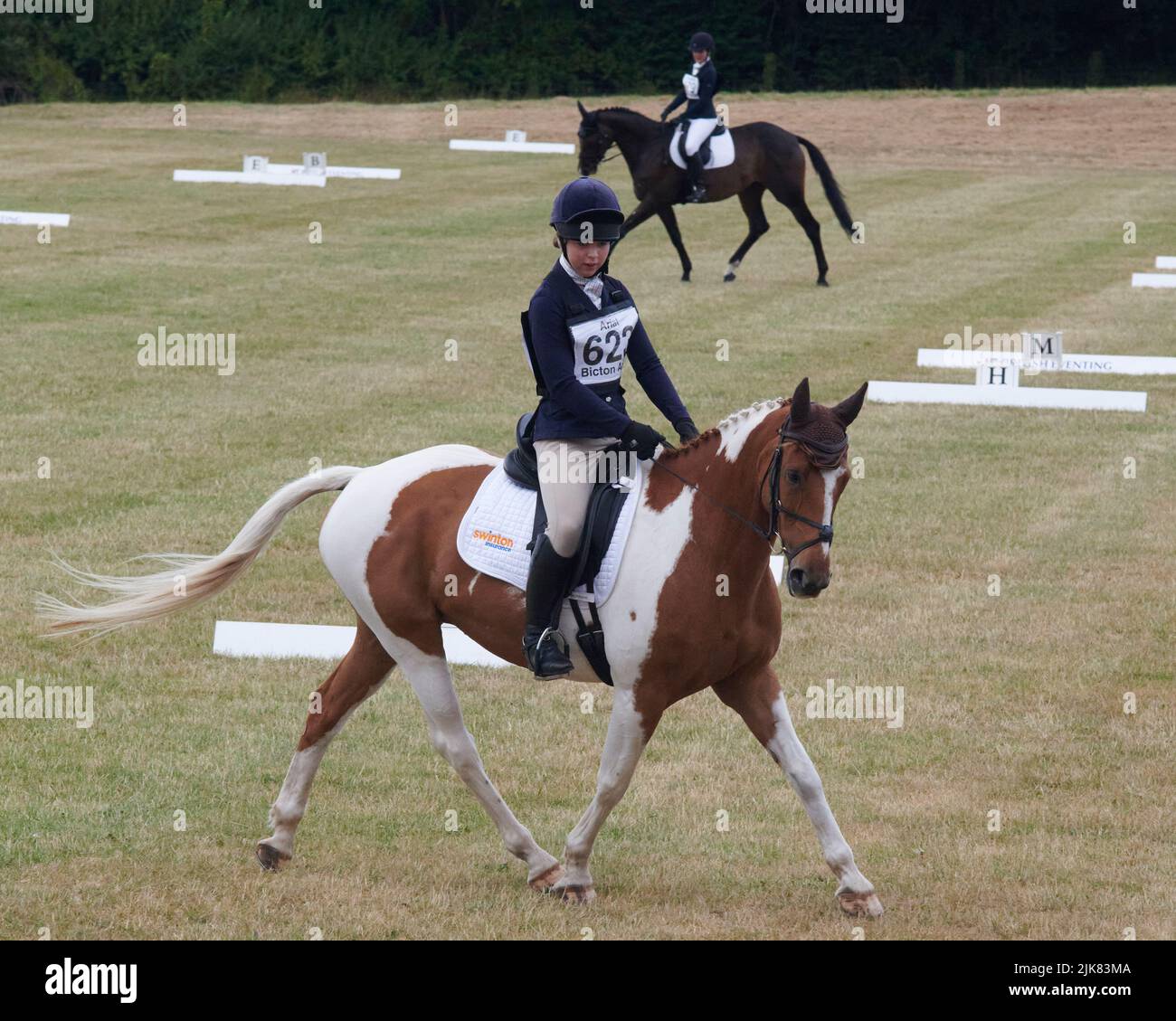 East Budleigh Salterton, United Kingdom, 31 Jul, 2022, Lily Diggle rides The Juggler III  in the Dressage section of Bicton Horse Trials at Bicton Horse Trials. Credit: Will Tudor/Alamy Live News Stock Photo