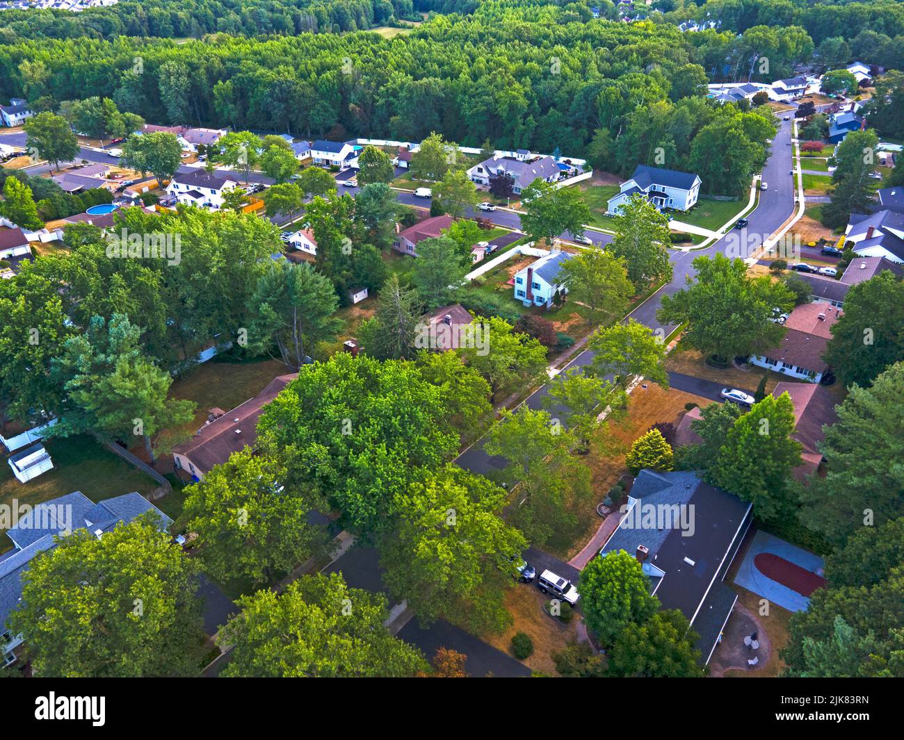Panoramic aerial view of a section of Old Bridge township from above the tree tops showing brown lawns, the effects of a recent drought -09 Stock Photo