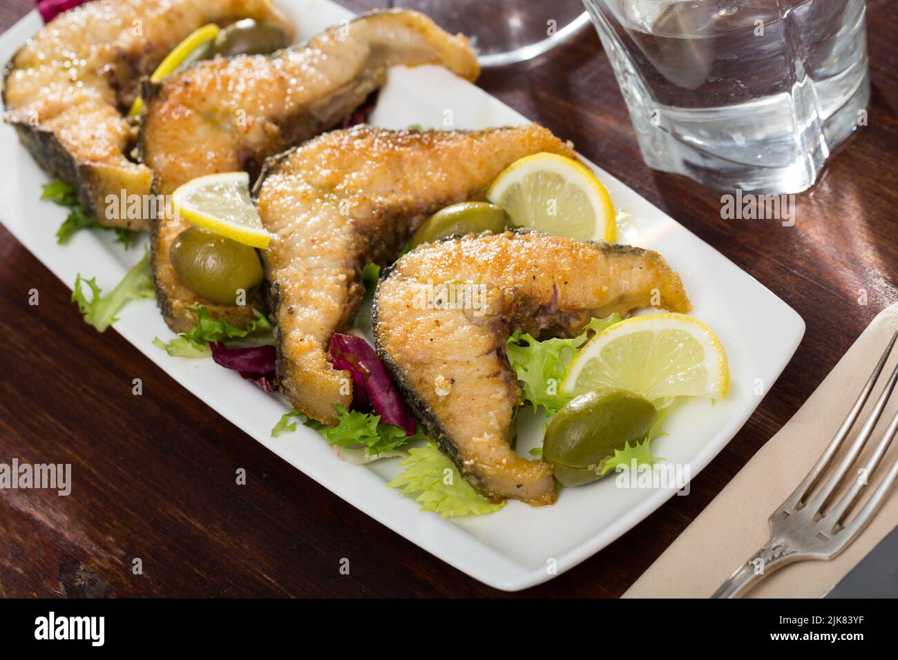 Slices of fried in flour sturgeon Stock Photo Alamy