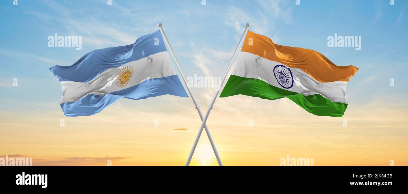 crossed national flags of Argentine and India flag waving in wind at ...
