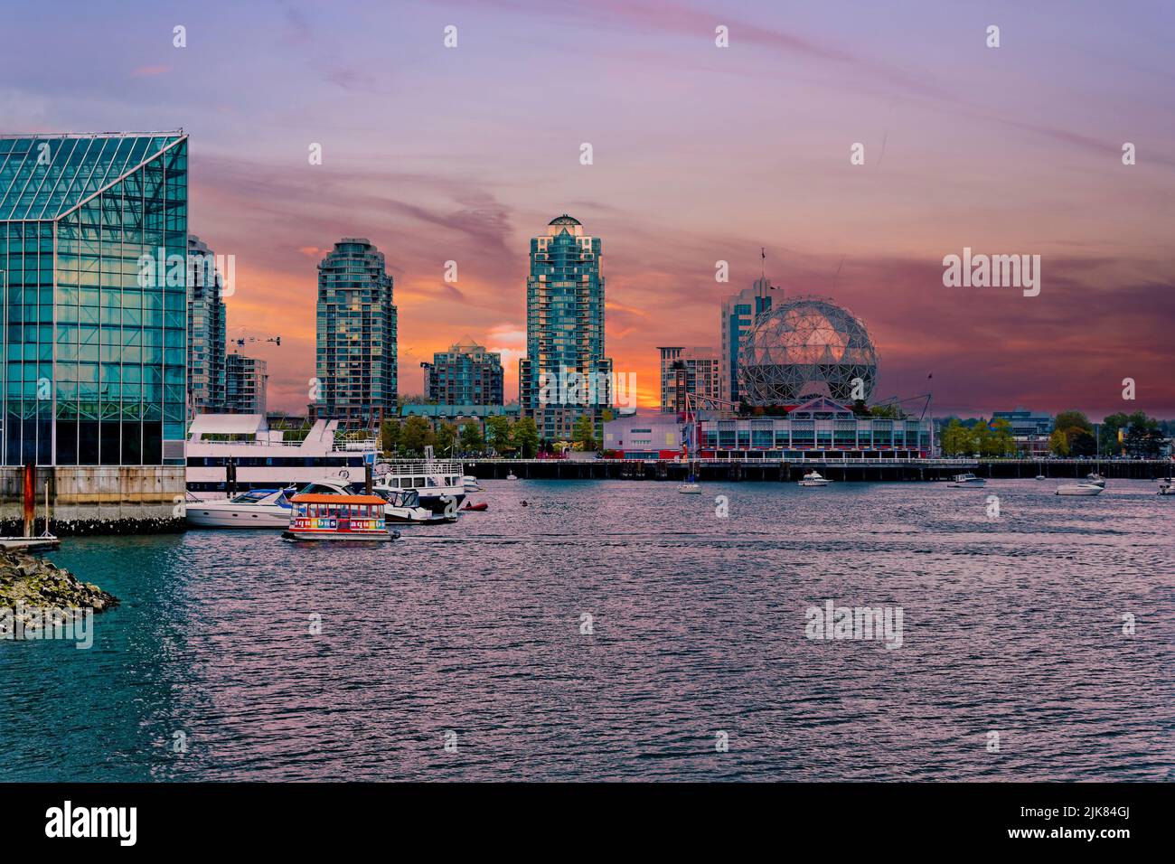 VANCOUVER, BRITISH COLUMBIA - April 30, 2022: Science World is a science center by False Creek in Vancouver, British Columbia, Canada. It features man Stock Photo
