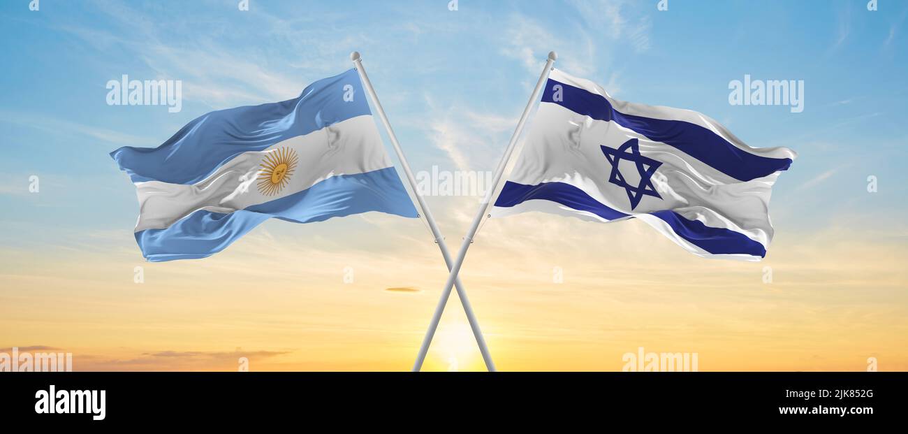 crossed national flags of Argentine and Israel flag waving in wind at ...