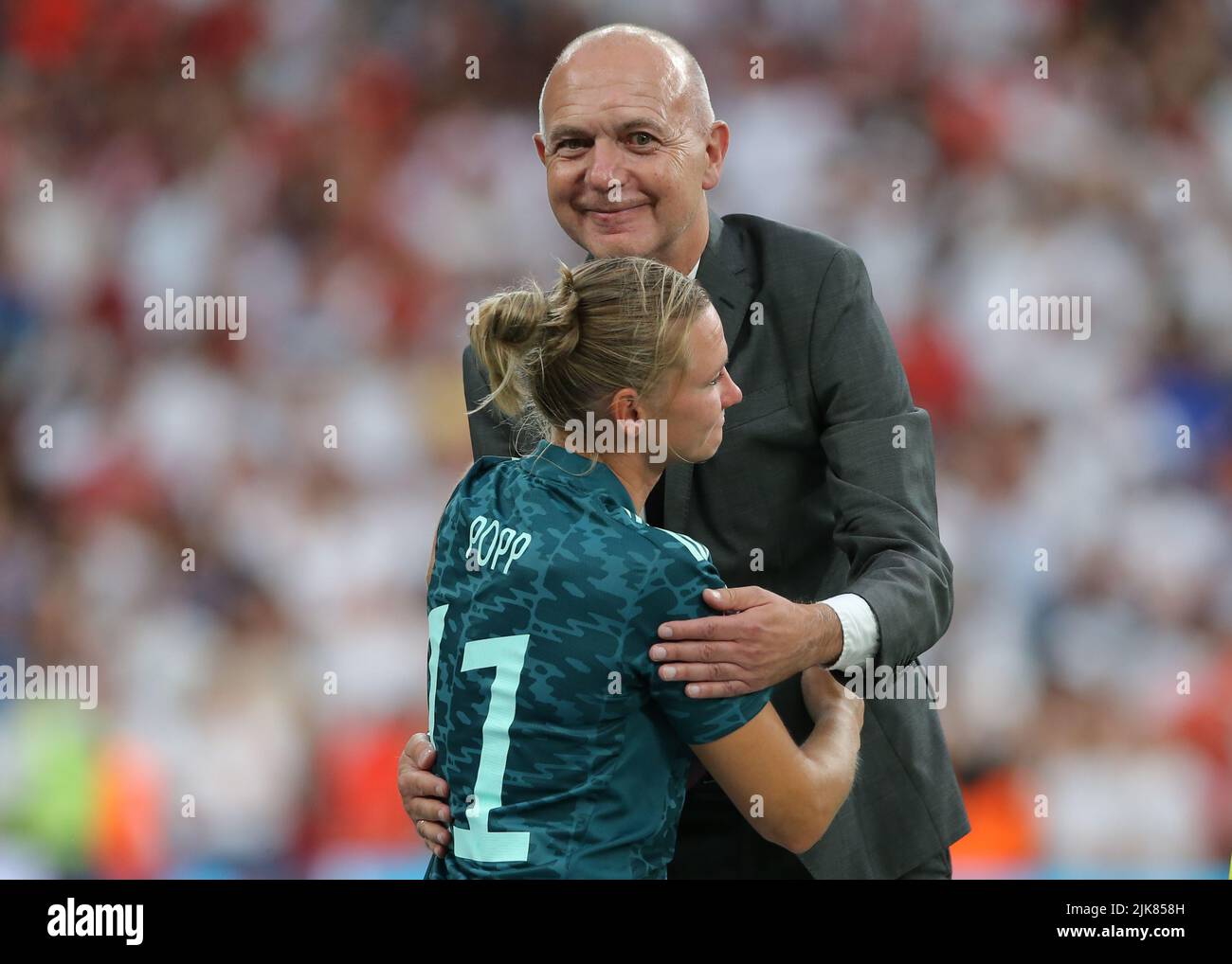 London, UK. 31st July, 2022. Bernd Neuendorf President of German Football Association embraces Alexandra Popp of Germany following the final whistle of the UEFA Women's European Championship 2022 match at Wembley Stadium, London. Picture credit should read: Jonathan Moscrop/Sportimage Credit: Sportimage/Alamy Live News Stock Photo
