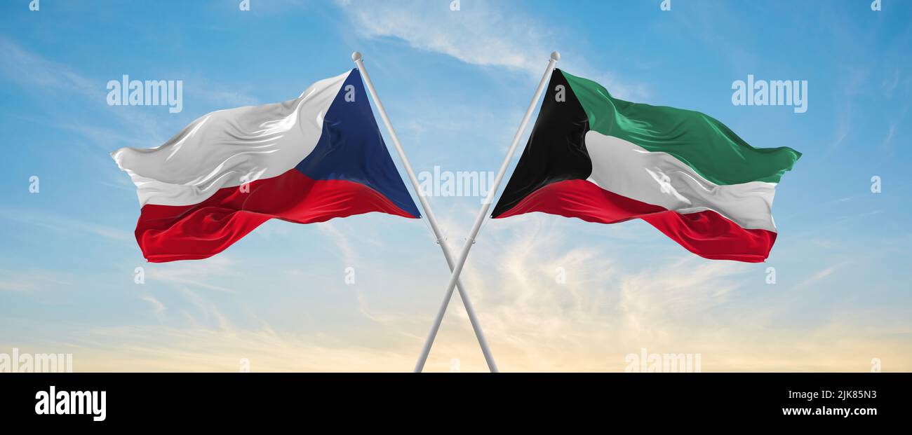 two crossed flags Kuwait and Czech republic waving in wind at cloudy ...