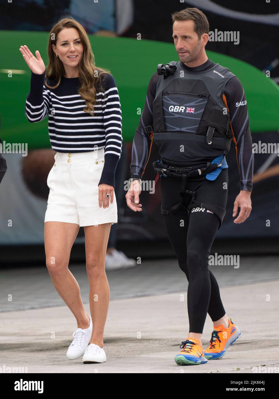 Plymouth, UK. 31 July, 2022.  Catherine, Duchess Of Cambridge chats to Sir Ben Ainslie as she visits the 1851 Trust and the Great Britain SailGP in Plymouth.  During the visit, the Duchess of Cambridge took part in activities educating young people about sustainability.  Credit: Anwar Hussein/Alamy Live News Stock Photo