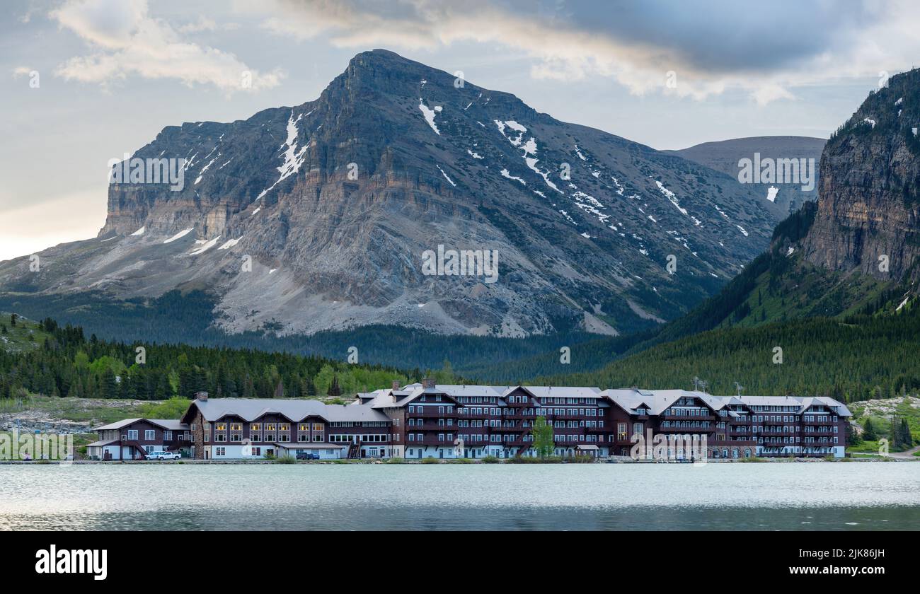 Fancy building in Glacier National Park with mountains Stock Photo