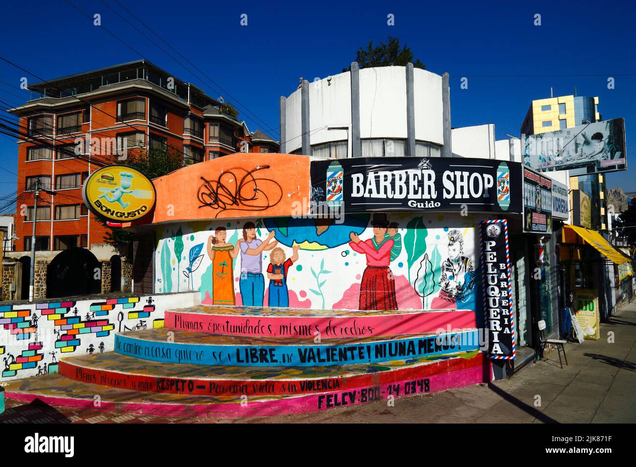 29th June 2022, Av Ballivian, Calacoto, La Paz, Bolivia. Mural on the wall of a barber shop in La Paz's Zona Sur district painted by feminist groups demanding equal opportunities and rights for women, and protesting against domestic violence and violence against women. Stock Photo