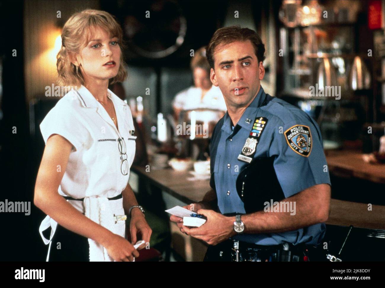 Bridget Fonda & Nicolas Cage Film: It Could Happen To You (1994) Characters: Yvonne Biasi & Charlie Lang  Director: Andrew Bergman 29 July 1994   **WARNING** This Photograph is for editorial use only and is the copyright of TRISTAR and/or the Photographer assigned by the Film or Production Company and can only be reproduced by publications in conjunction with the promotion of the above Film. A Mandatory Credit To TRISTAR is required. The Photographer should also be credited when known. No commercial use can be granted without written authority from the Film Company. Stock Photo