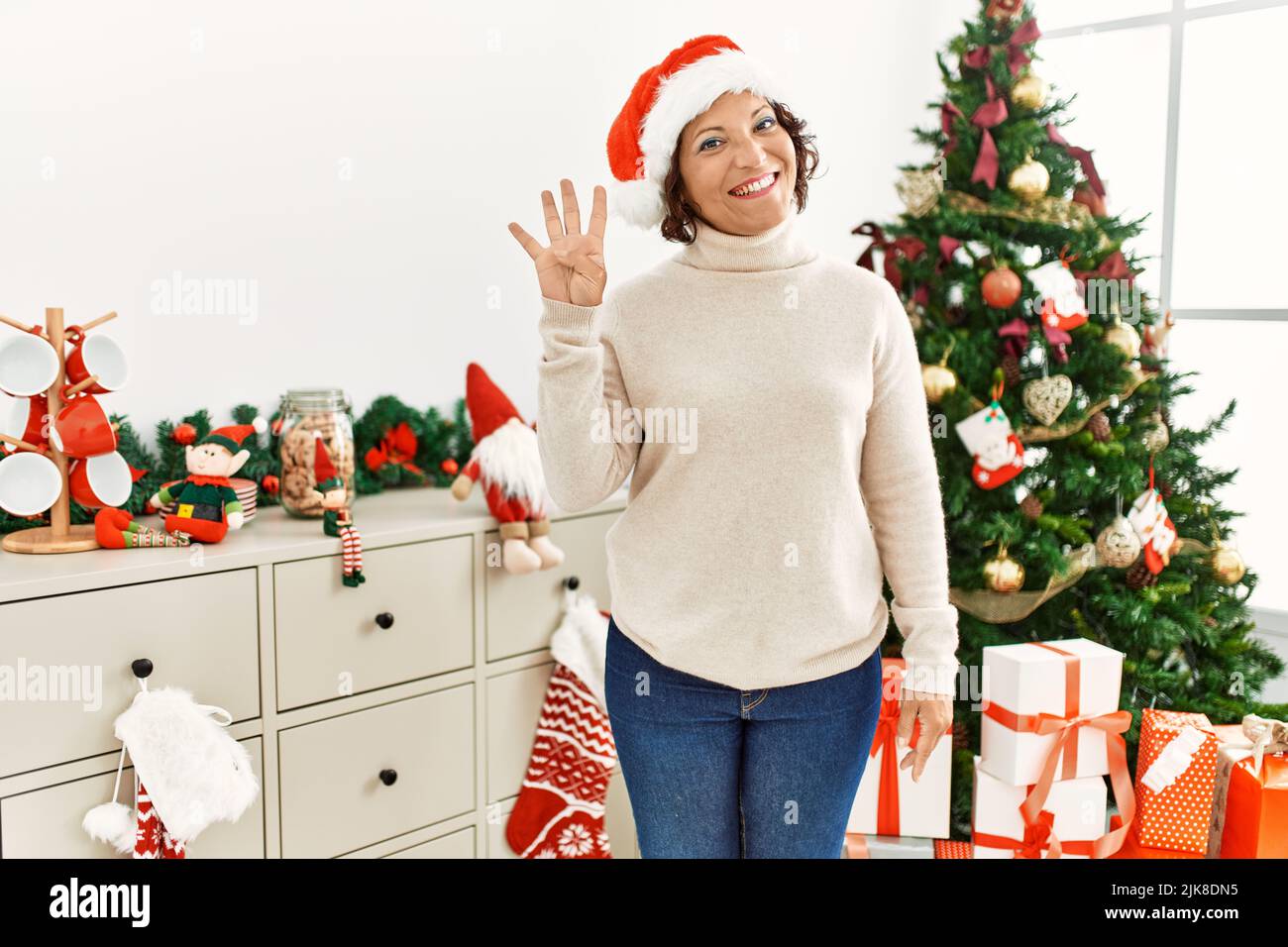 Girl showing four fingers hand hi-res stock photography and images - Alamy