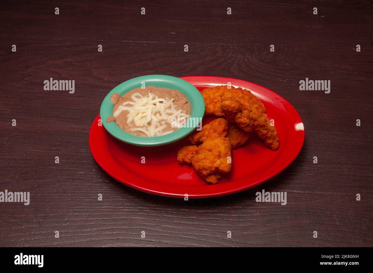 American cuisine dish known as chicken tenders Stock Photo Alamy
