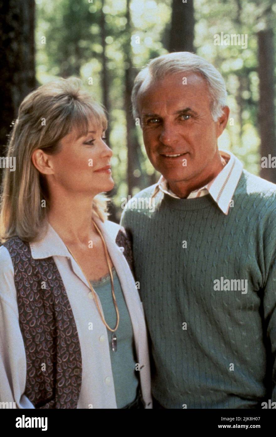 Dee Wallace & Robert Conrad Film: Search & Rescue (1992) Characters: Morgan (as Dee Wallace Stone) & Tooter  Director: Paul Krasny 27 March 1994   **WARNING** This Photograph is for editorial use only and is the copyright of The Film Company and/or the Photographer assigned by the Film or Production Company and can only be reproduced by publications in conjunction with the promotion of the above Film. A Mandatory Credit To The Film Company is required. The Photographer should also be credited when known. No commercial use can be granted without written authority from the Film Company. Stock Photo