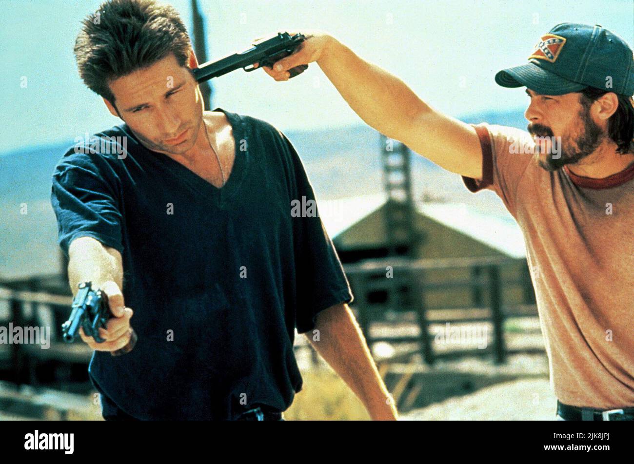 David Duchovny & Brad Pitt Film: Kalifornia (USA 1993) Characters: Brian Kessler & Early Grayce  Director: Dominic Sena 03 September 1993   **WARNING** This Photograph is for editorial use only and is the copyright of PROPAGANDA FILMS and/or the Photographer assigned by the Film or Production Company and can only be reproduced by publications in conjunction with the promotion of the above Film. A Mandatory Credit To PROPAGANDA FILMS is required. The Photographer should also be credited when known. No commercial use can be granted without written authority from the Film Company. Stock Photo