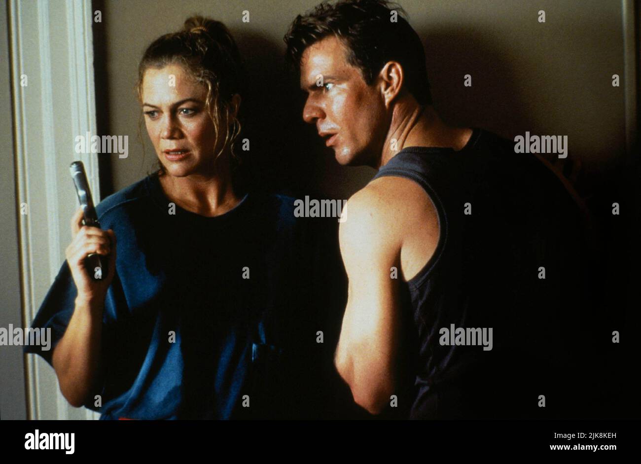 Kathleen Turner & Dennis Quaid Film: Undercover Blues (1993) Characters: Jane Blue & Jefferson 'Jeff' Blue  Director: Herbert Ross 10 September 1993   **WARNING** This Photograph is for editorial use only and is the copyright of MGM and/or the Photographer assigned by the Film or Production Company and can only be reproduced by publications in conjunction with the promotion of the above Film. A Mandatory Credit To MGM is required. The Photographer should also be credited when known. No commercial use can be granted without written authority from the Film Company. Stock Photo