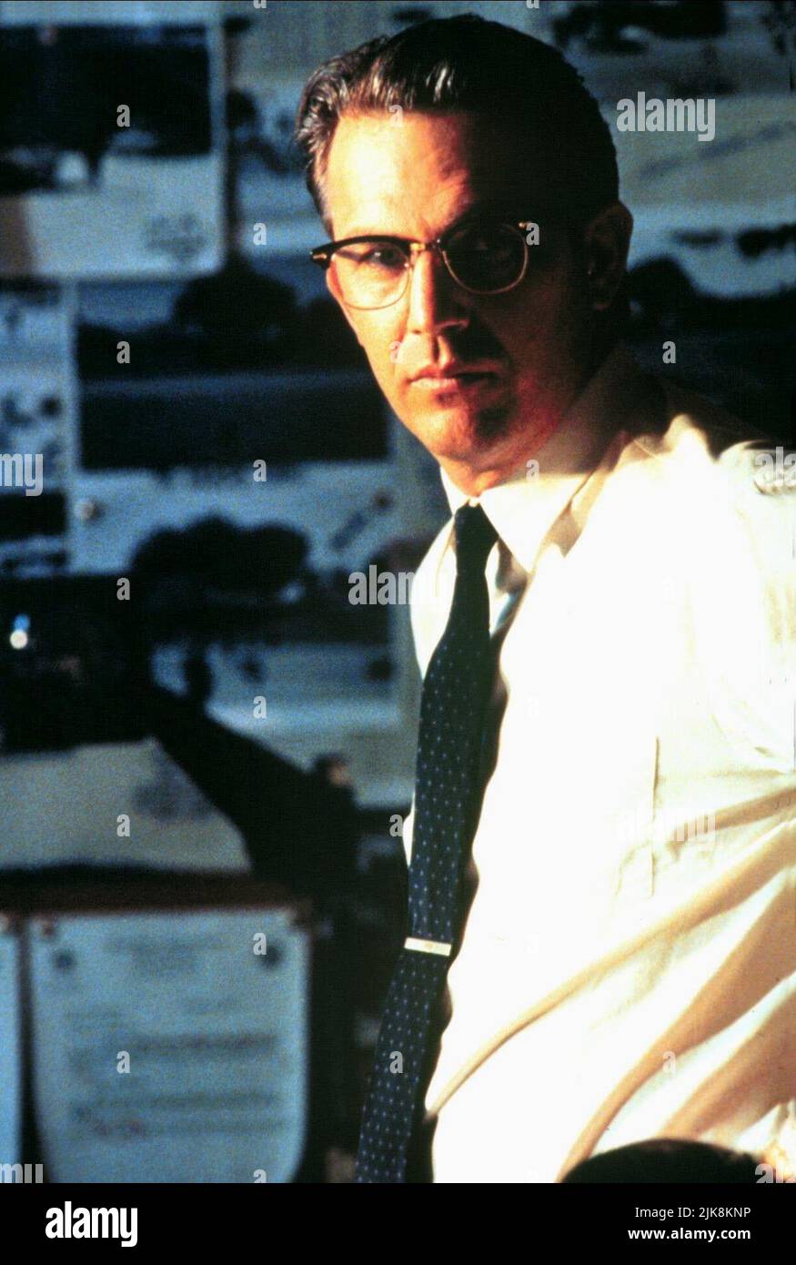 Kevin Costner  Film Jfk; J.F.K. (USA/FR 1991) Characters: Jim Garrison  Director: Oliver Stone 20 December 1991   **WARNING** This Photograph is for editorial use only and is the copyright of WARNER BROS. and/or the Photographer assigned by the  Film or Production Company and can only be reproduced by publications in conjunction with the promotion of the above  Film. A Mandatory Credit To WARNER BROS. is required. The Photographer should also be credited when known. No commercial use can be granted without written authority from the  Film Company. Stock Photo