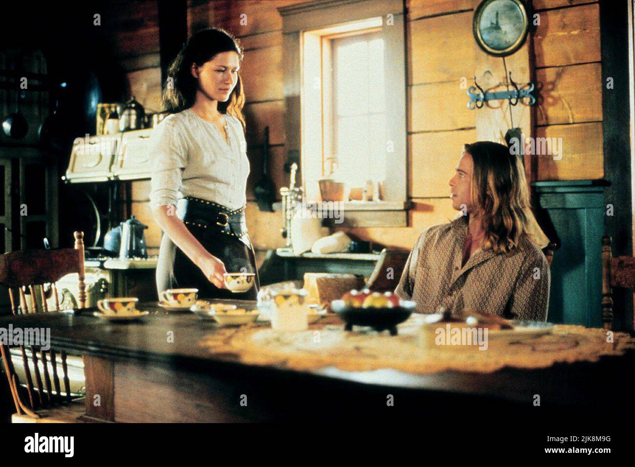 Karina Lombard & Brad Pitt Film: Legends Of The Fall (USA 1994) Characters: Isabel Two Decker Ludlow & Tristan Ludlow  Director: Edward Zwick 23 December 1994   **WARNING** This Photograph is for editorial use only and is the copyright of COLUMBIA TRISTAR and/or the Photographer assigned by the Film or Production Company and can only be reproduced by publications in conjunction with the promotion of the above Film. A Mandatory Credit To COLUMBIA TRISTAR is required. The Photographer should also be credited when known. No commercial use can be granted without written authority from the Film Com Stock Photo