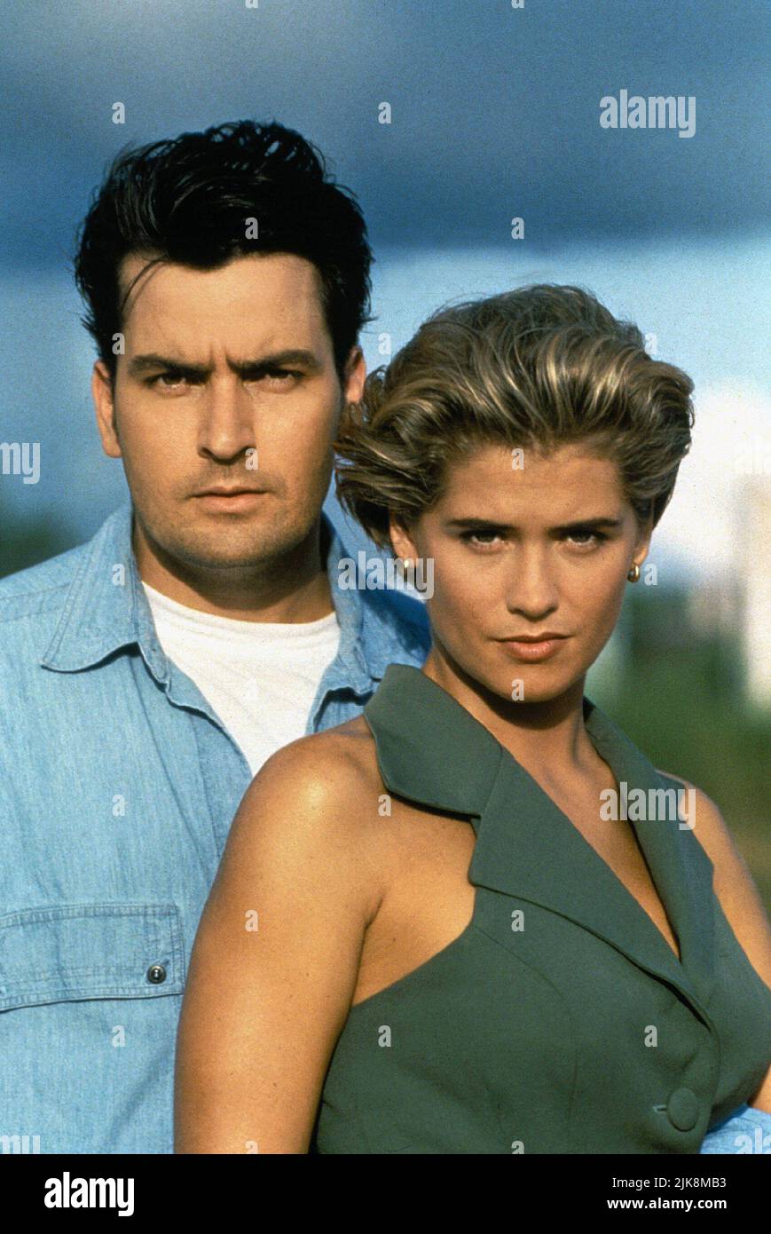Charlie Sheen & Kristy Swanson Film: The Chase (1992) Characters: Jackson Davis Hammond & Natalie Voss  Director: Adam Rifkin 04 March 1994   **WARNING** This Photograph is for editorial use only and is the copyright of 20 CENTURY FOX and/or the Photographer assigned by the Film or Production Company and can only be reproduced by publications in conjunction with the promotion of the above Film. A Mandatory Credit To 20 CENTURY FOX is required. The Photographer should also be credited when known. No commercial use can be granted without written authority from the Film Company. Stock Photo