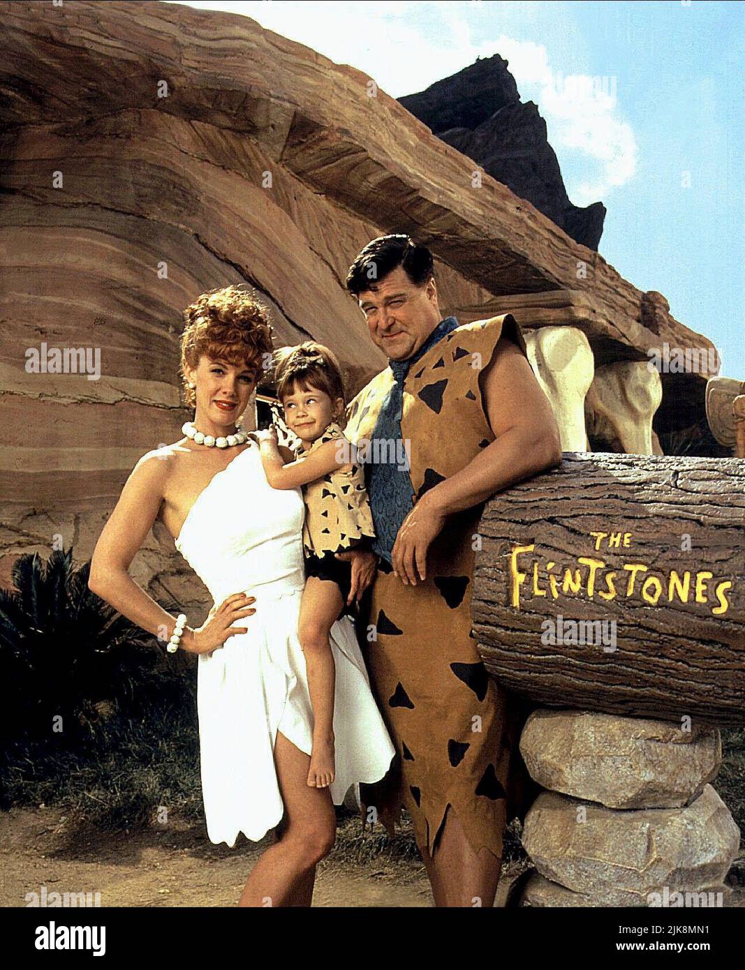 Elizabeth Perkins, Melanie Silver & John Goodman Film: The Flintstones (USA 1994) Characters: Wilma Flintstone,Pebbles,Fred Flintstone  Director: Brian Levant 23 May 1994   **WARNING** This Photograph is for editorial use only and is the copyright of HANNA-BARBERAUNIVERSAL and/or the Photographer assigned by the Film or Production Company and can only be reproduced by publications in conjunction with the promotion of the above Film. A Mandatory Credit To HANNA-BARBERAUNIVERSAL is required. The Photographer should also be credited when known. No commercial use can be granted without written a Stock Photo