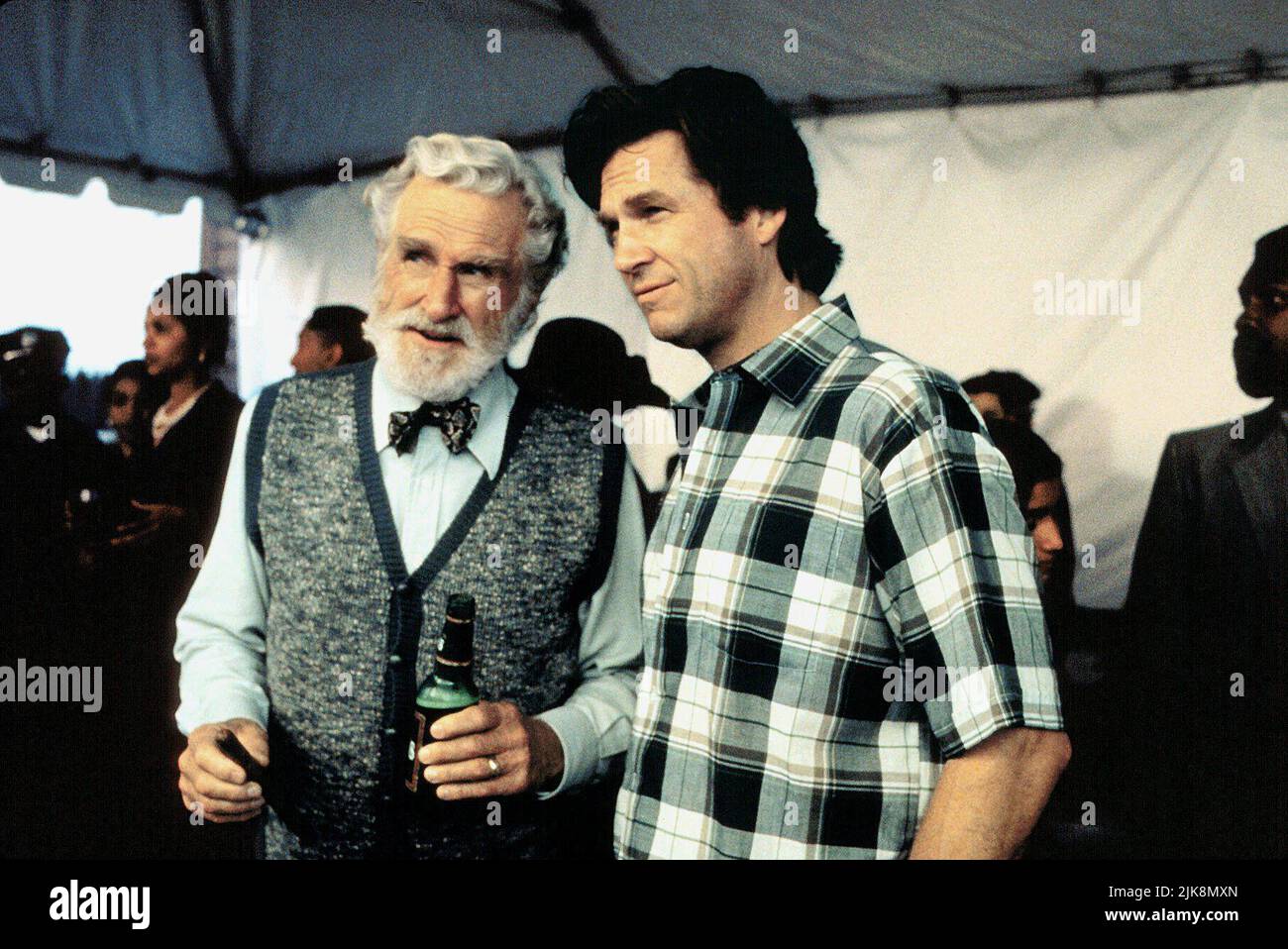 Lloyd Bridges & Jeff Bridges Film: Blown Away (1994) Characters: Max O'Bannon & James 'Jimmy' Dove / Liam McGivney  Director: Stephen Hopkins 01 July 1994   **WARNING** This Photograph is for editorial use only and is the copyright of MGM and/or the Photographer assigned by the Film or Production Company and can only be reproduced by publications in conjunction with the promotion of the above Film. A Mandatory Credit To MGM is required. The Photographer should also be credited when known. No commercial use can be granted without written authority from the Film Company. Stock Photo