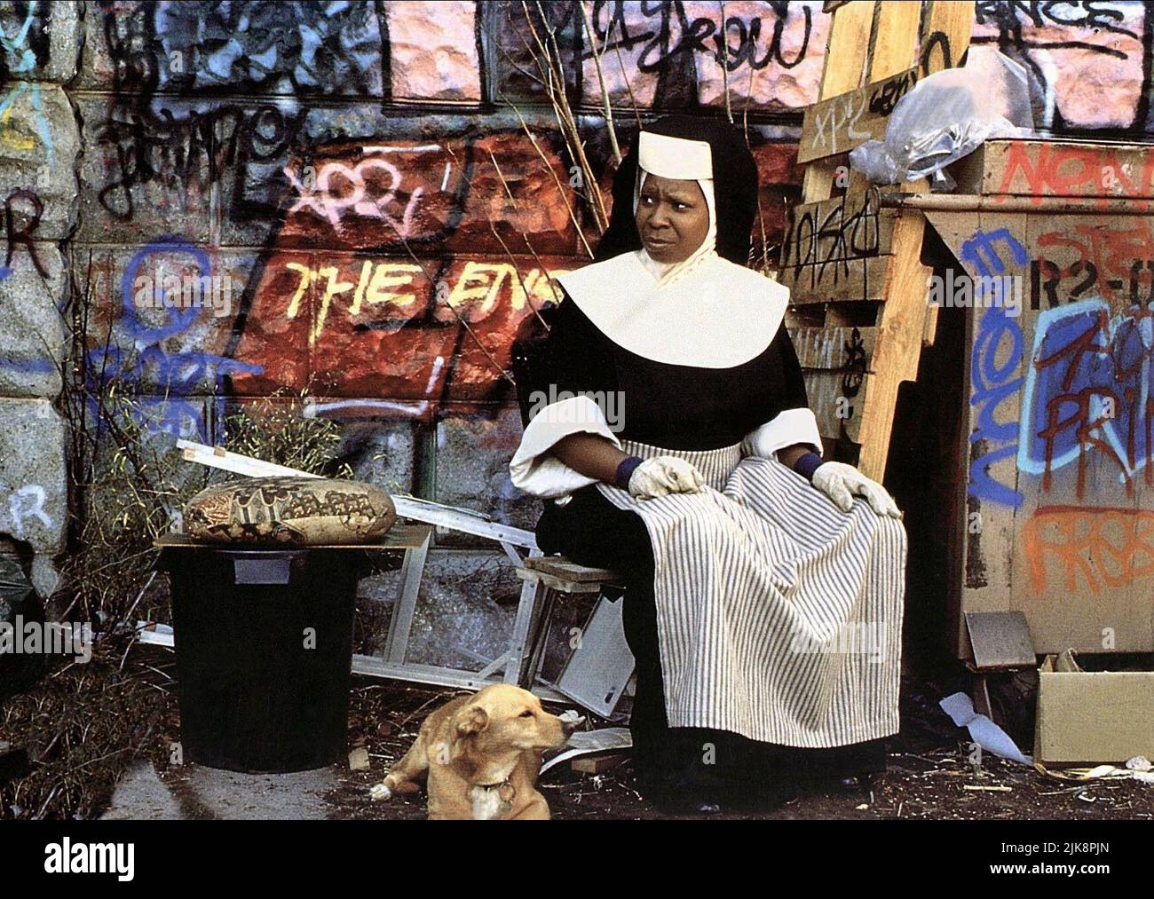 Whoopi Goldberg Film: Sister Act (USA 1992) Characters: Deloris Van Cartier  Director: Emile Ardolino 29 May 1992   **WARNING** This Photograph is for editorial use only and is the copyright of TOUCHSTONE and/or the Photographer assigned by the Film or Production Company and can only be reproduced by publications in conjunction with the promotion of the above Film. A Mandatory Credit To TOUCHSTONE is required. The Photographer should also be credited when known. No commercial use can be granted without written authority from the Film Company. Stock Photo