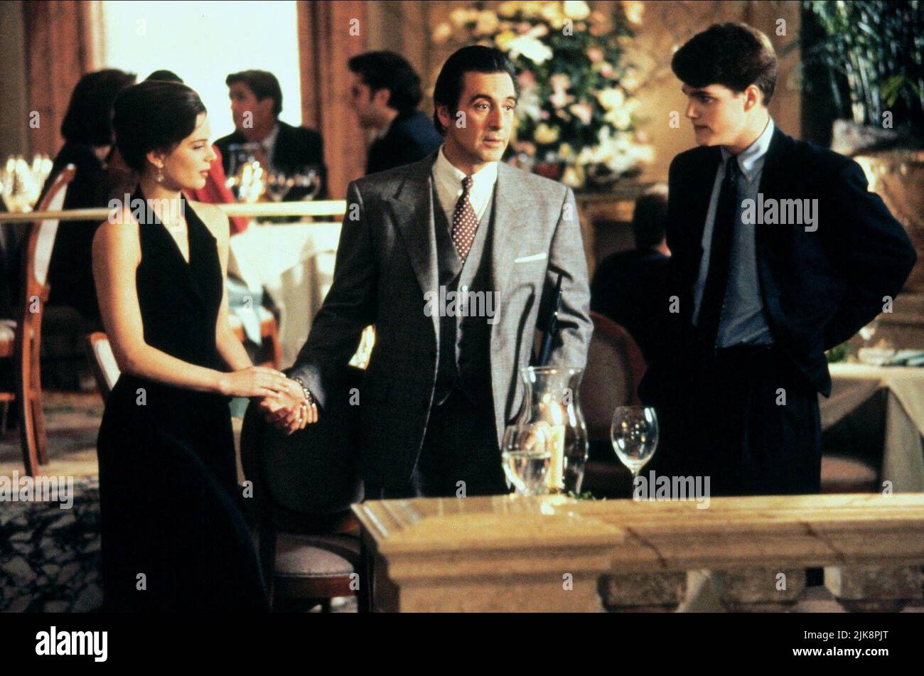 Gabrielle Anwar, Al Pacino & Chris O'Donnell Film: Scent Of A Woman (USA 1992) Characters: Donna,Lieutenant Colonel Frank Slade,Charlie Simms  Director: Martin Brest 23 December 1992   **WARNING** This Photograph is for editorial use only and is the copyright of UNIVERSAL and/or the Photographer assigned by the Film or Production Company and can only be reproduced by publications in conjunction with the promotion of the above Film. A Mandatory Credit To UNIVERSAL is required. The Photographer should also be credited when known. No commercial use can be granted without written authority from th Stock Photo