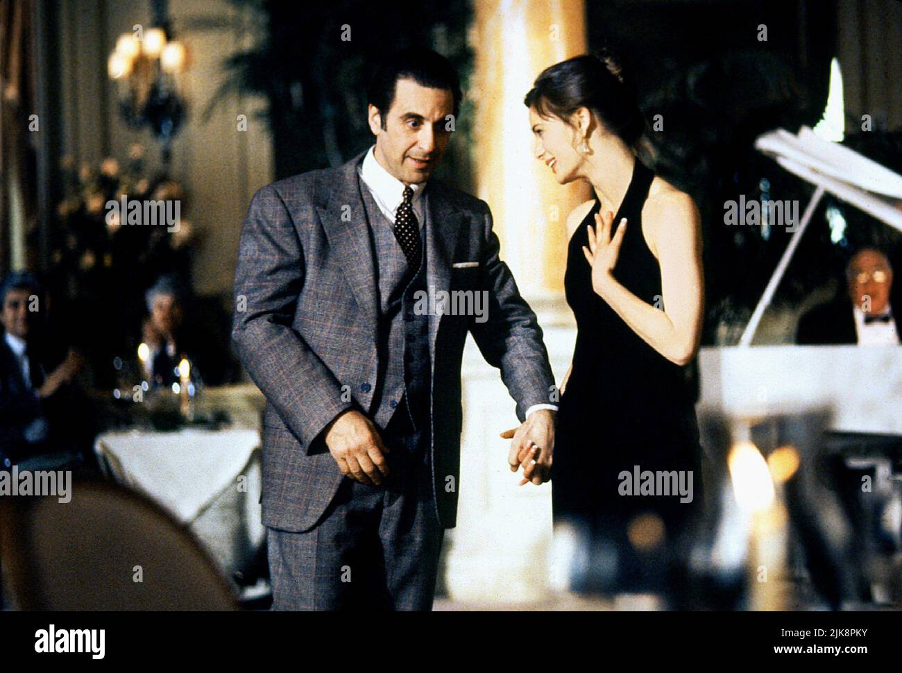 Al Pacino & Gabrielle Anwar Film: Scent Of A Woman (USA 1992) Characters: Lieutenant Colonel Frank Slade & Donna  Director: Martin Brest 23 December 1992   **WARNING** This Photograph is for editorial use only and is the copyright of UNIVERSAL and/or the Photographer assigned by the Film or Production Company and can only be reproduced by publications in conjunction with the promotion of the above Film. A Mandatory Credit To UNIVERSAL is required. The Photographer should also be credited when known. No commercial use can be granted without written authority from the Film Company. Stock Photo